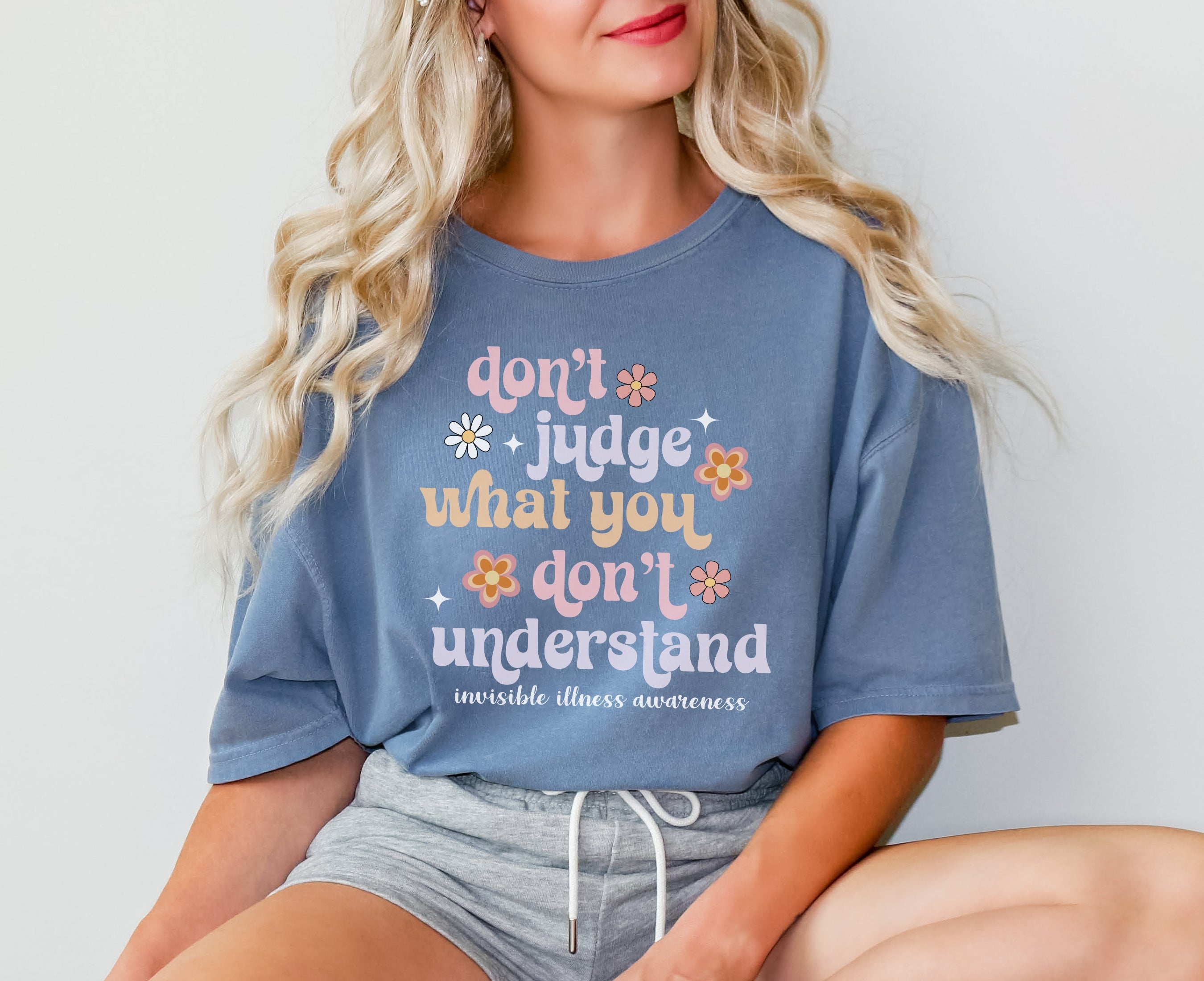 Girl wearing Comfort Colors invisible illness awareness shirt in blue jean