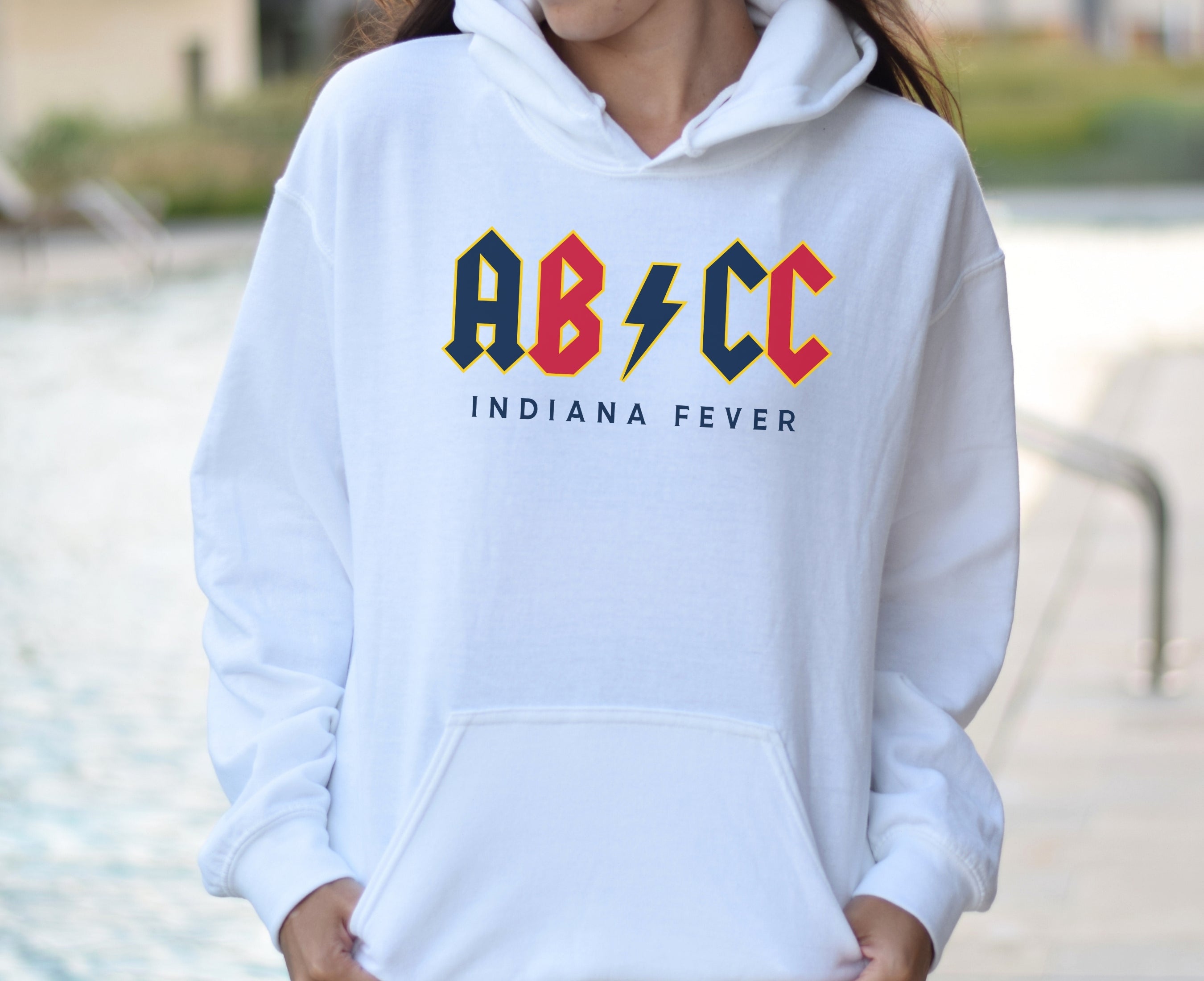 Girl wearing white Aliyah Boston Caitlin Clark hoodie