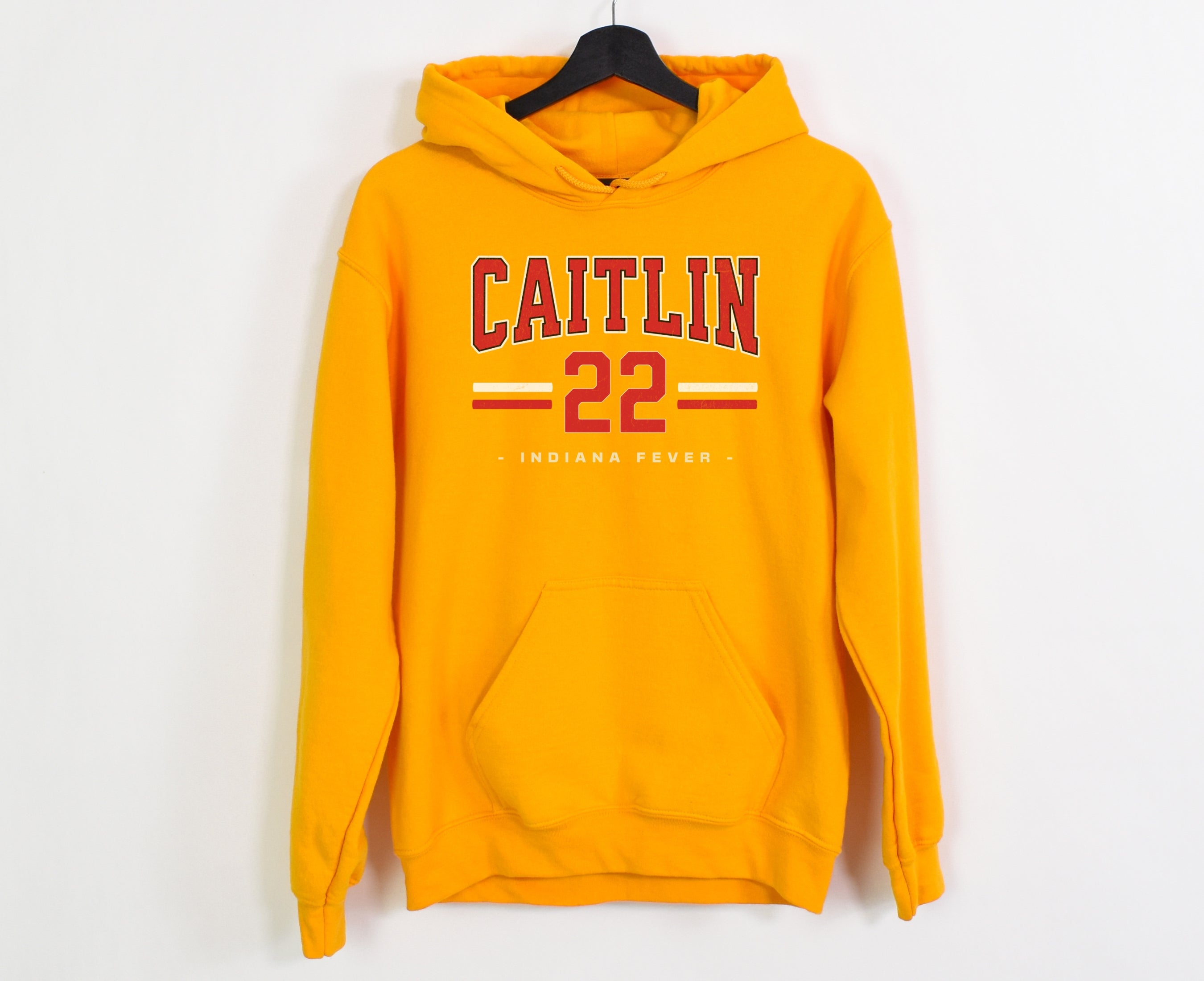 Gold Caitlin Clark 22 Hoodie on hanger