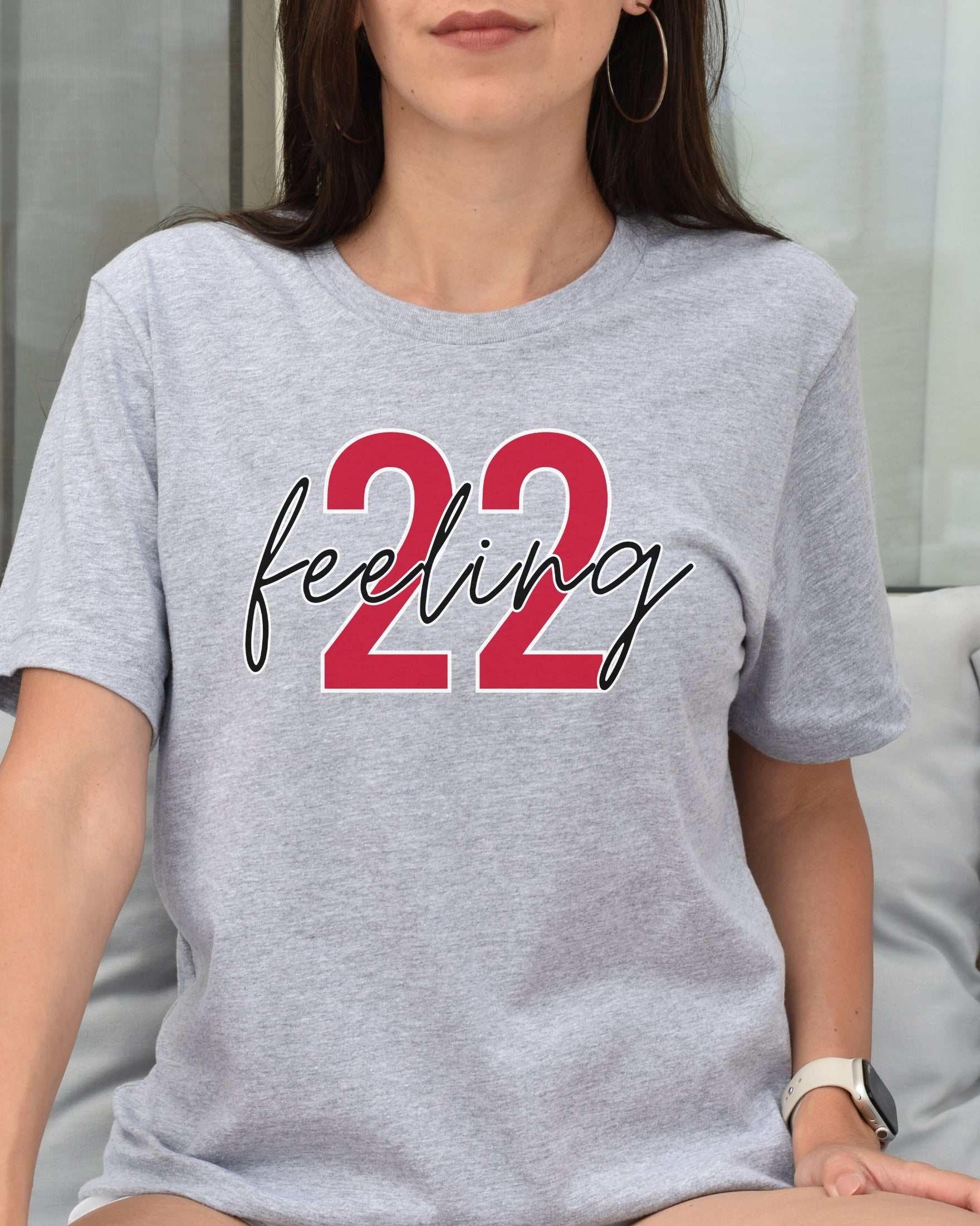 Girl wearing athletic heather feeling 22 t-shirt