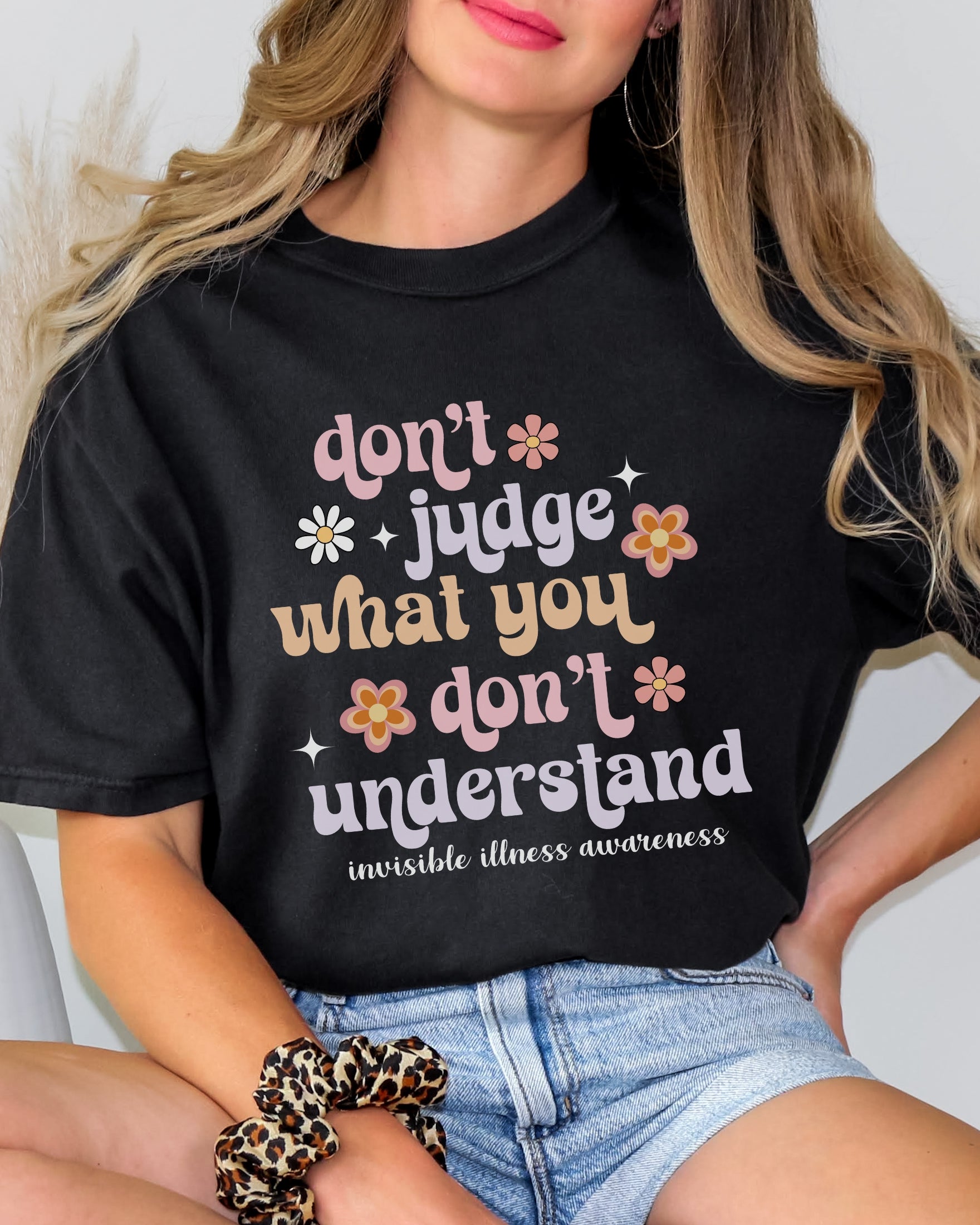 Girl wearing Comfort Colors invisible illness awareness shirt in black