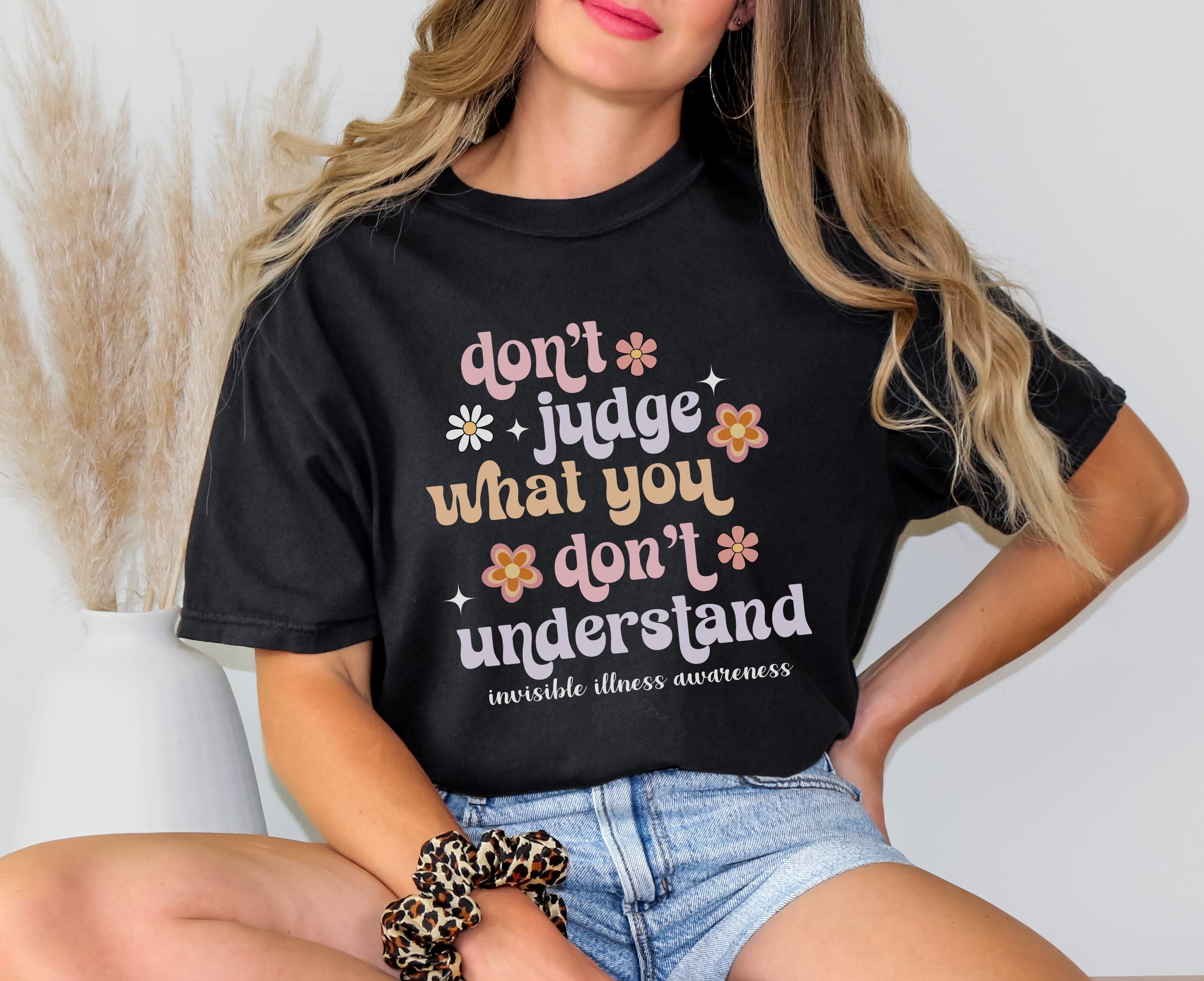 Girl wearing Comfort Colors invisible illness awareness shirt in black