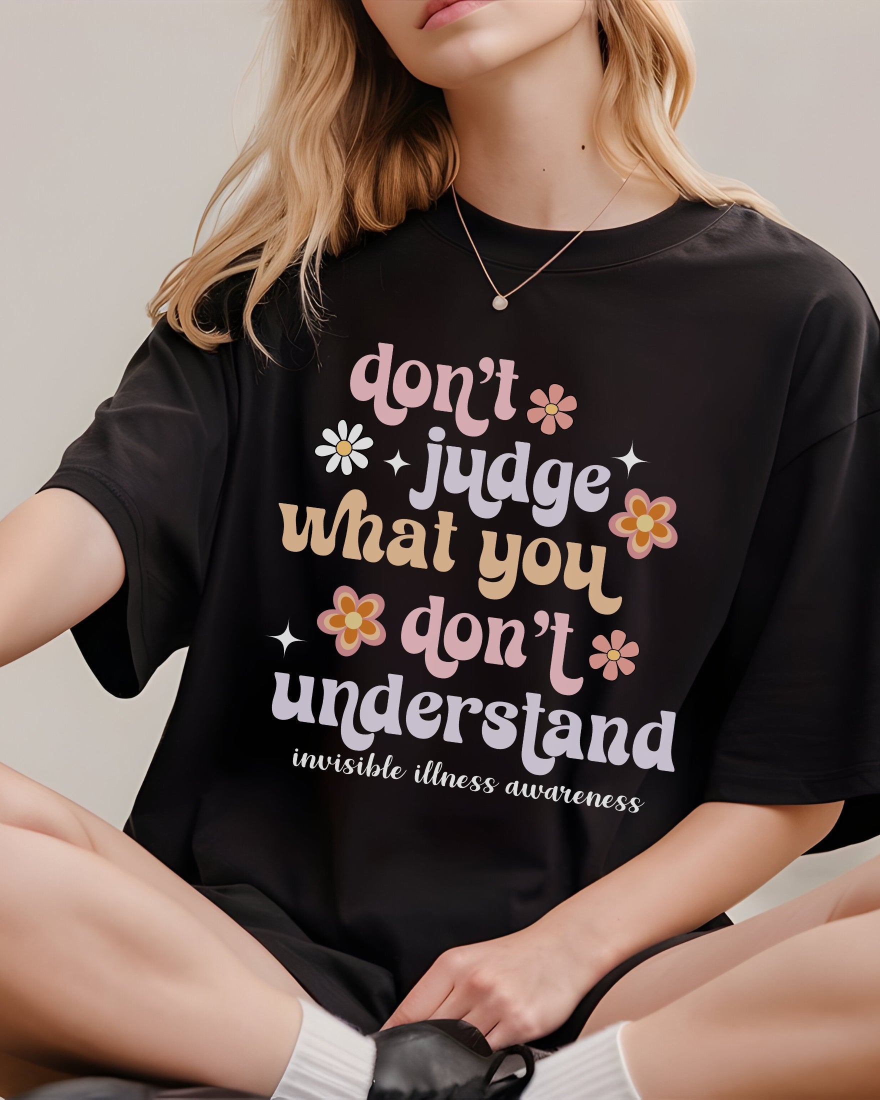 Girl wearing Comfort Colors invisible illness awareness shirt in black