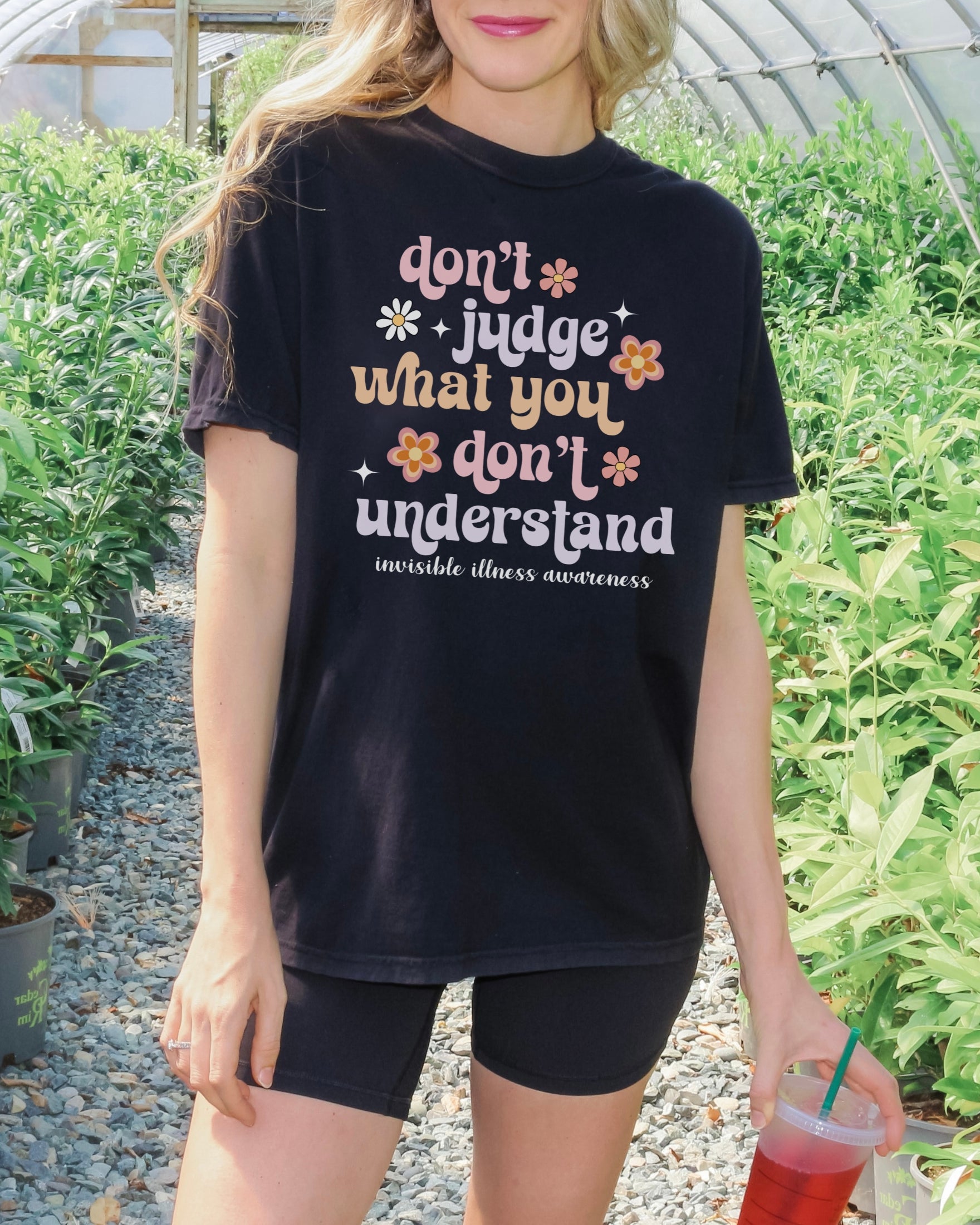 Girl wearing Comfort Colors invisible illness awareness shirt in black