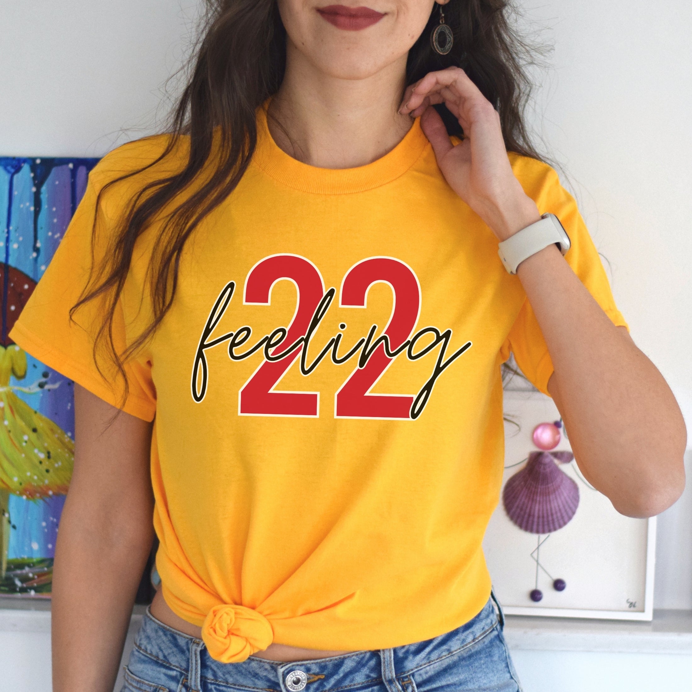 Girl wearing gold feeling 22 t-shirt