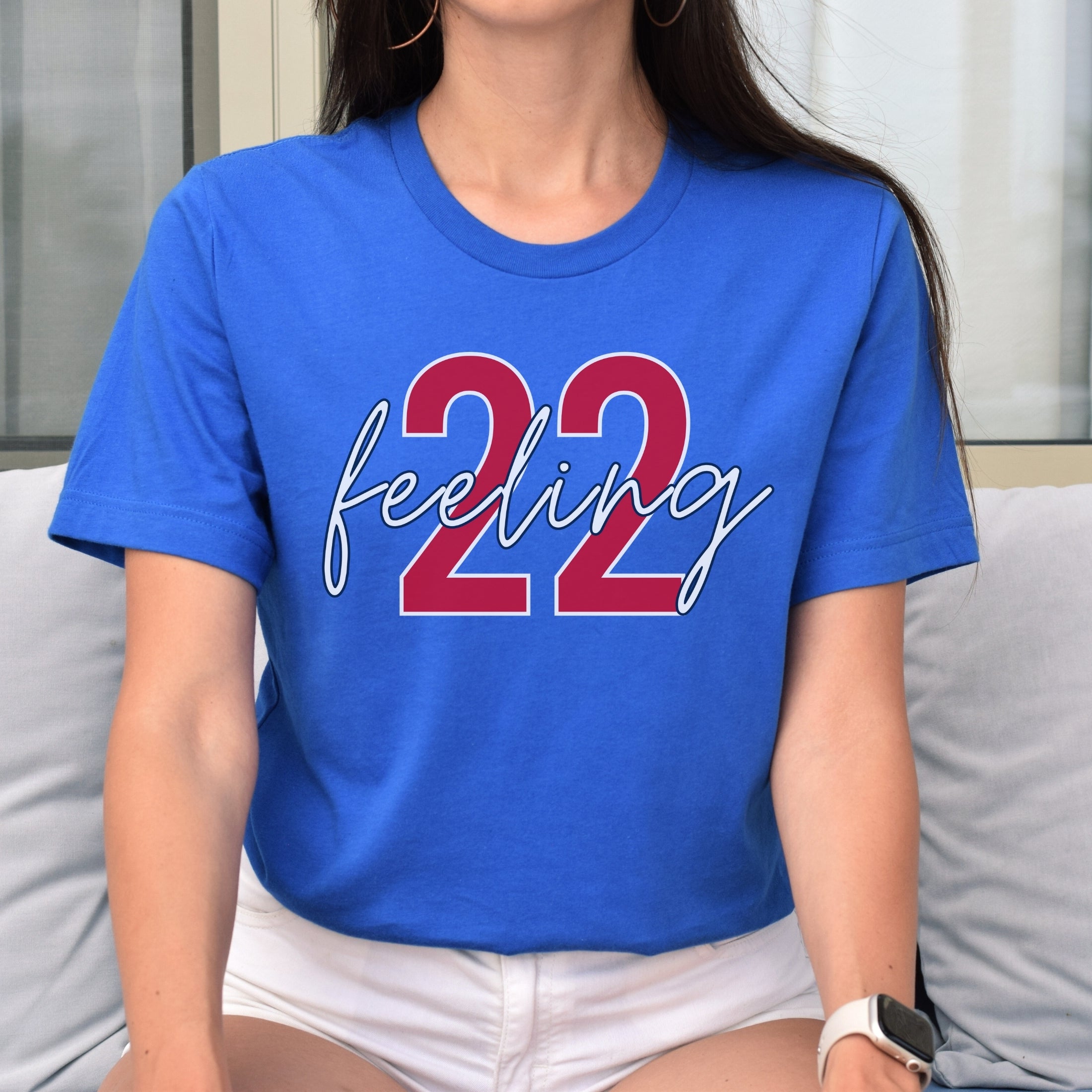 Woman wearing heather true royal feeling 22 t-shirt
