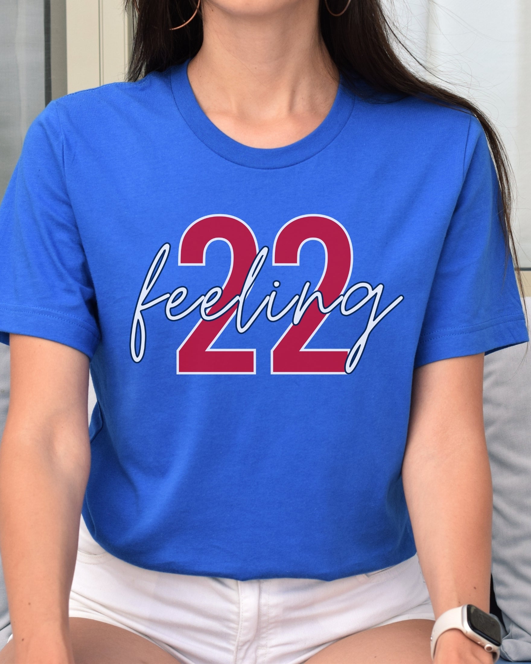 Woman wearing heather true royal feeling 22 t-shirt