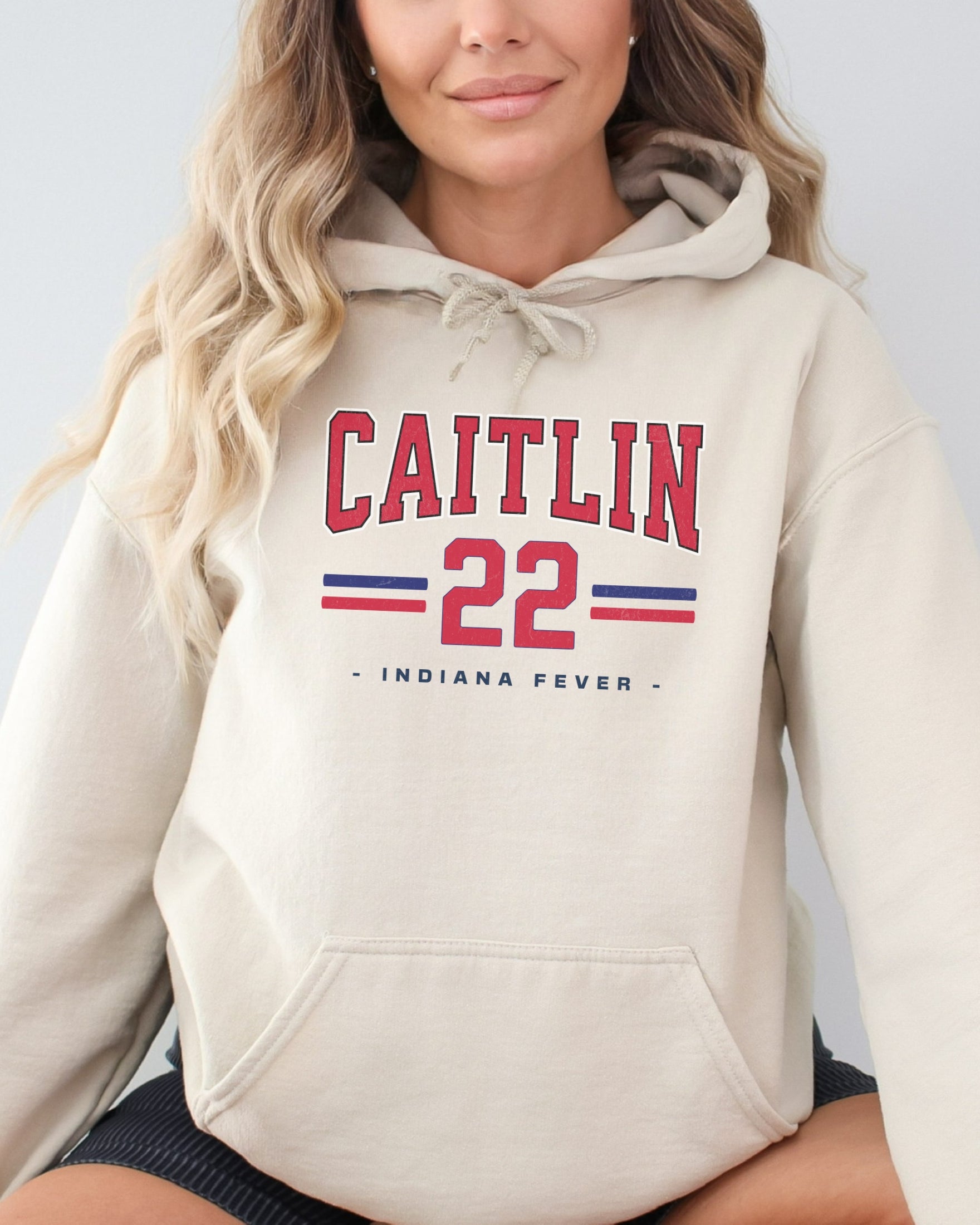 Girl wearing sand Caitlin Clark 22 Hoodie