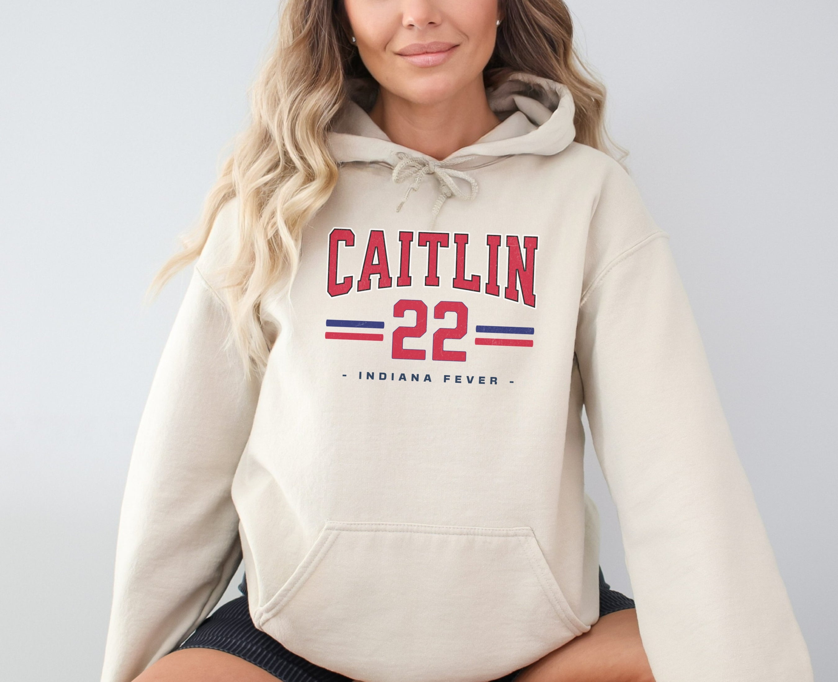 Girl wearing sand Caitlin Clark 22 Hoodie