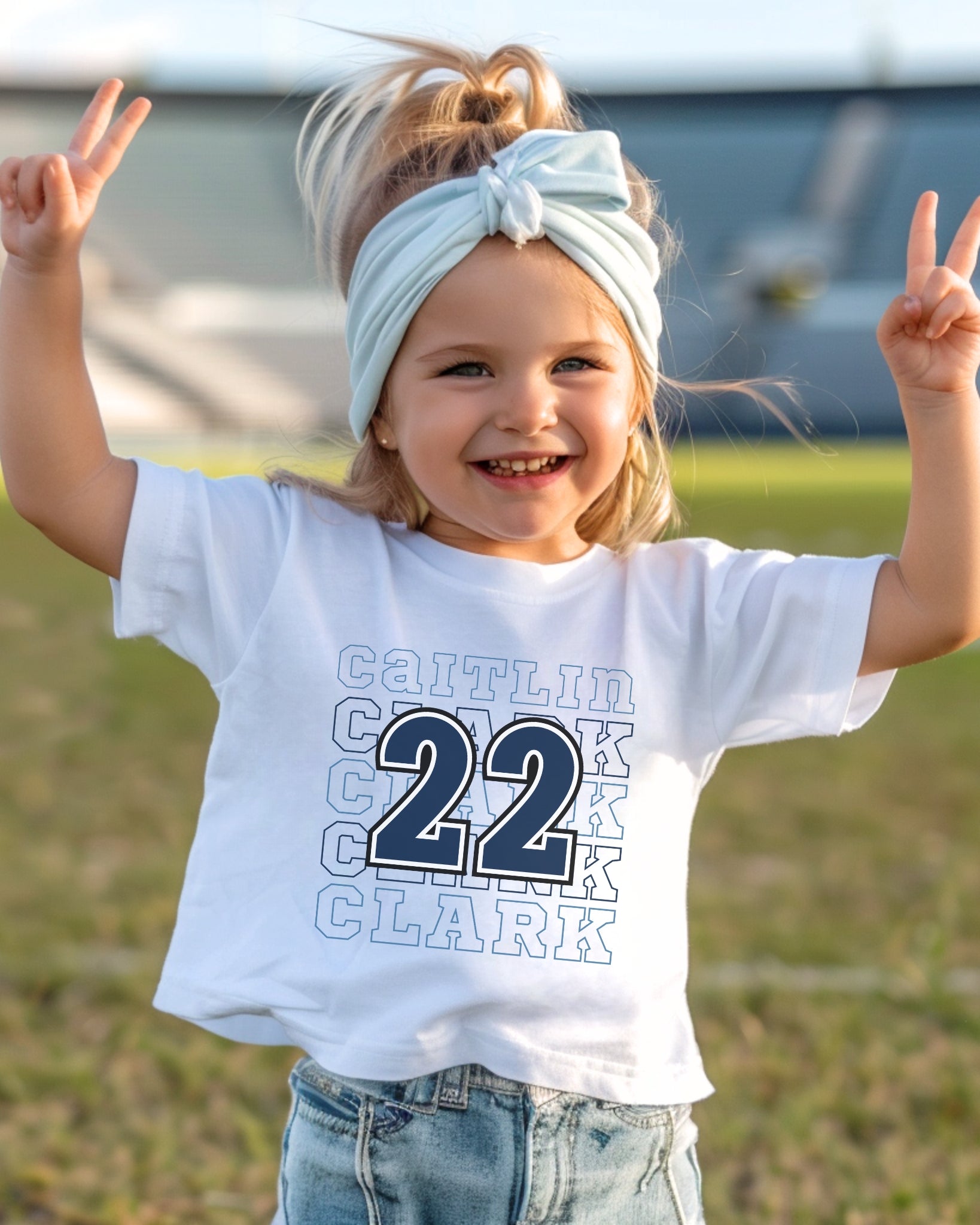 Little girl wearing white Caitlin Clark 22 Toddler T-Shirts