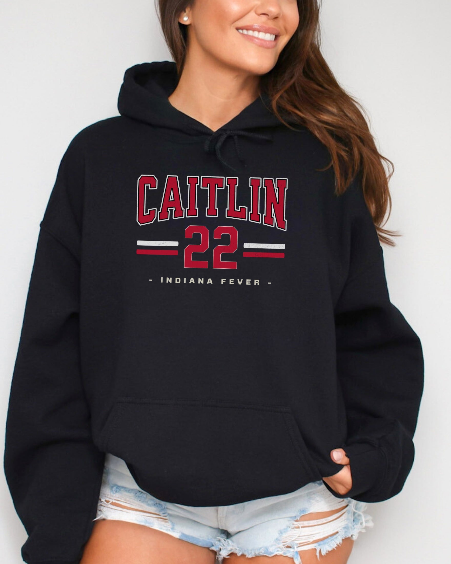 Girl wearing black Caitlin Clark 22 Hoodie