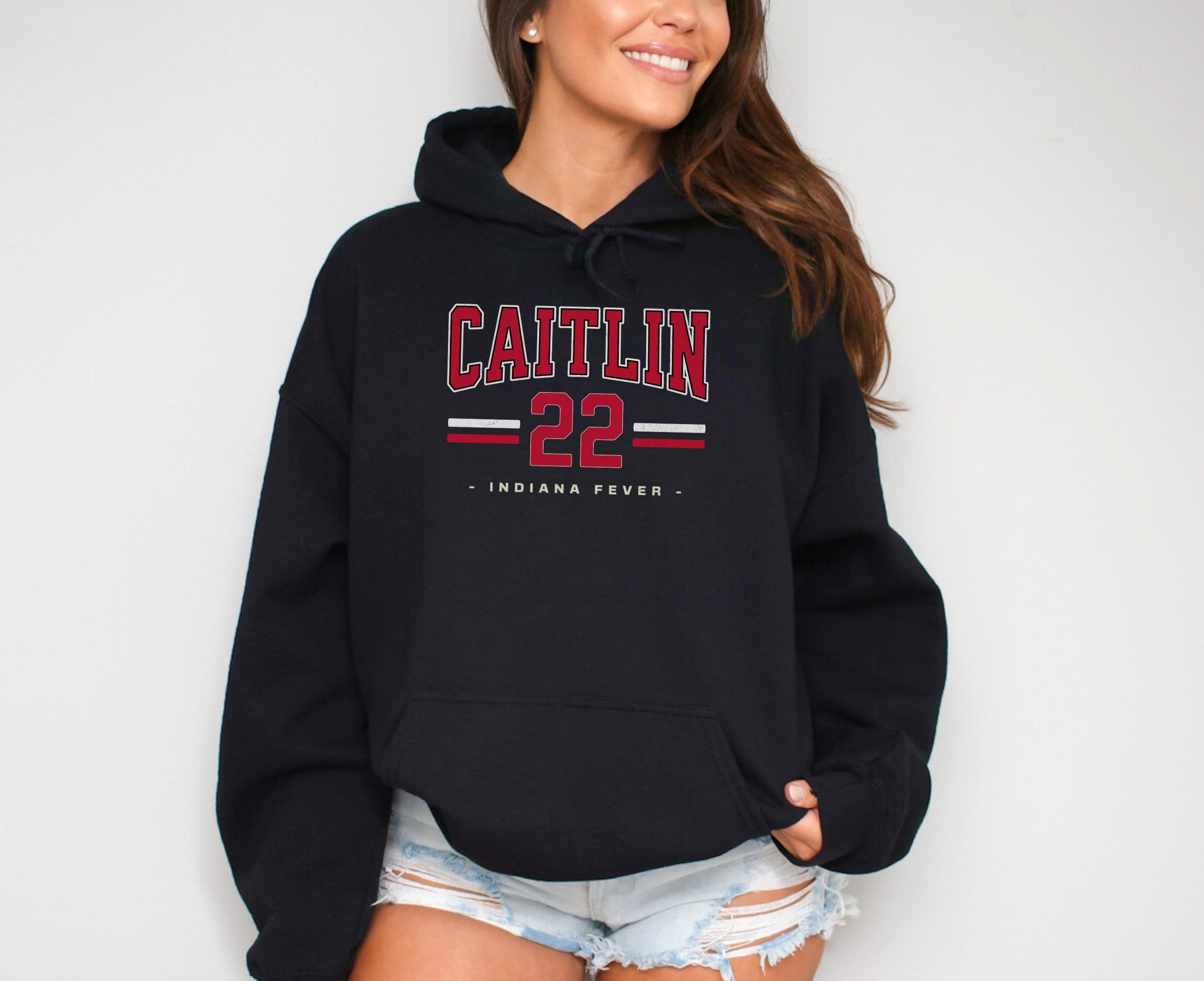 Girl wearing black Caitlin Clark 22 Hoodie
