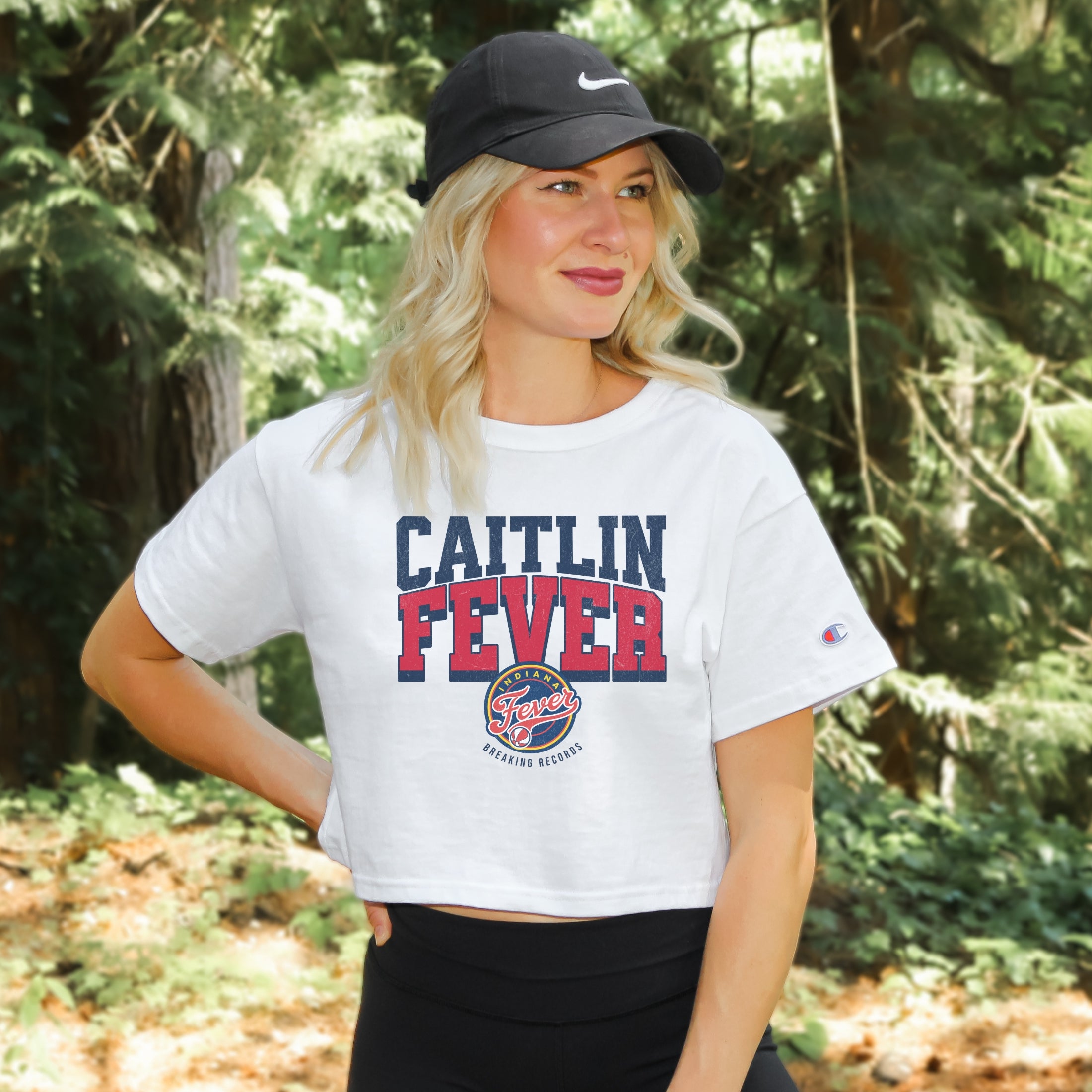 Girl wearing white Caitlin Fever Crop Top