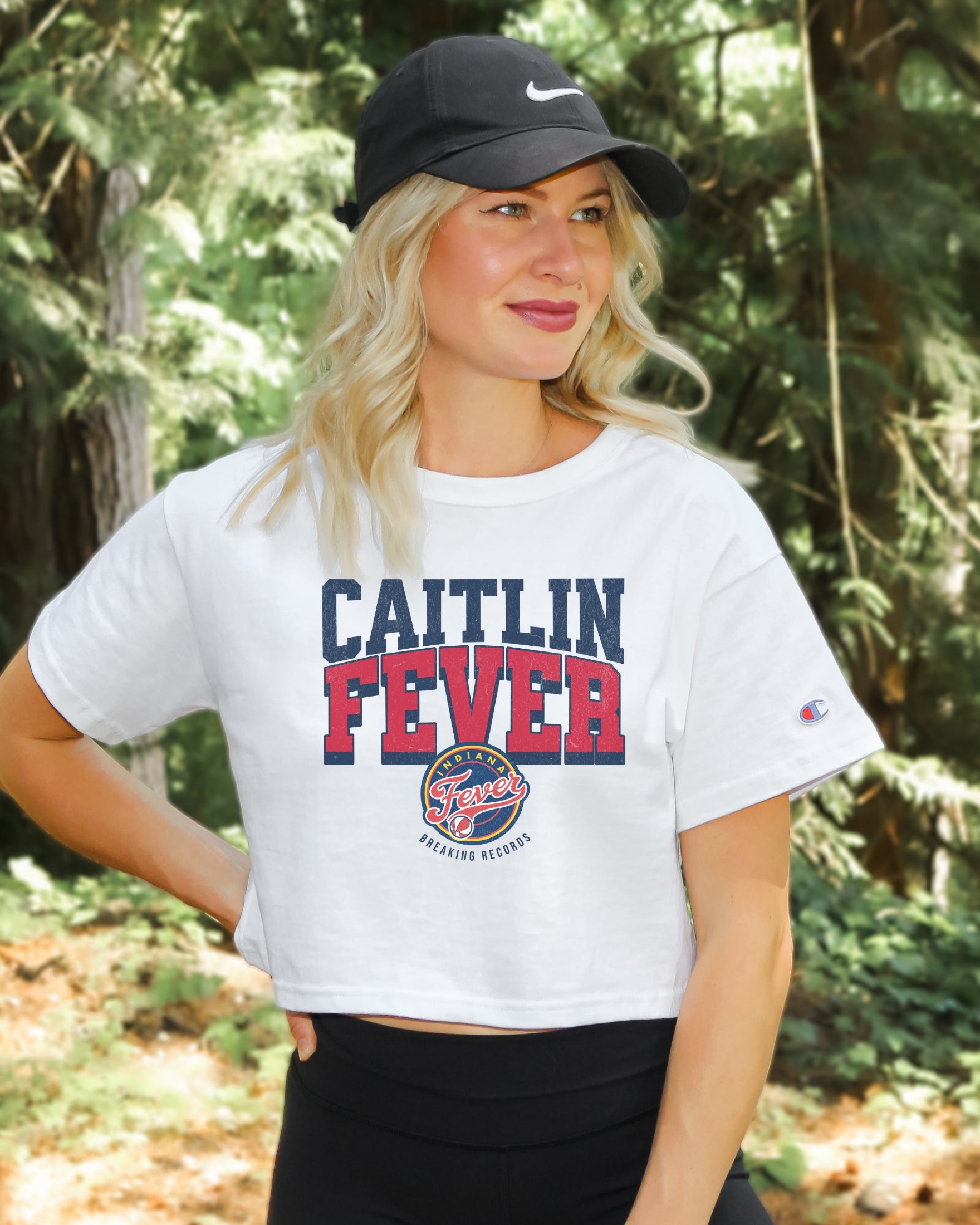 Girl wearing white Caitlin Fever Crop Top