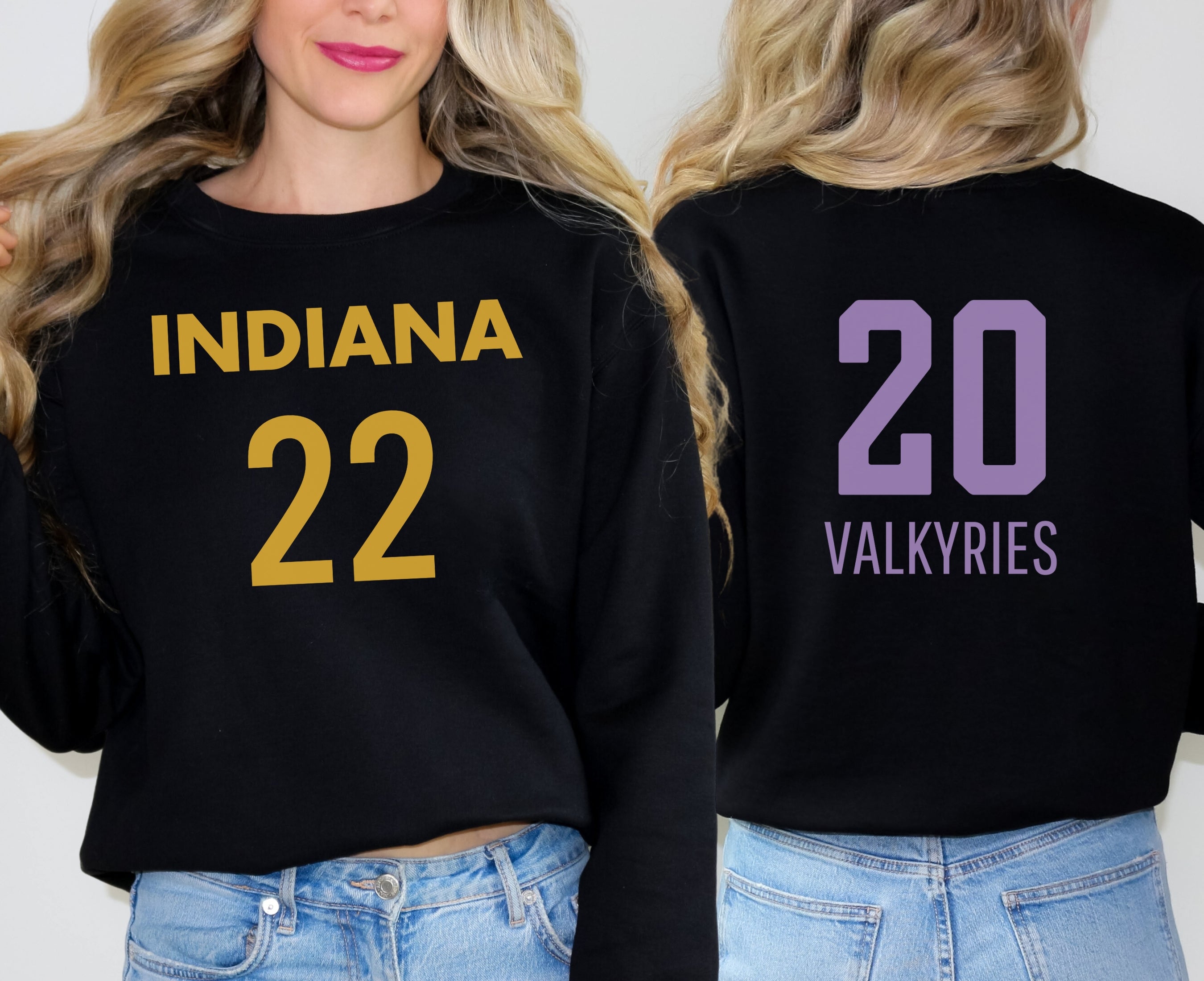 Girl wearing black sweatshirt with Indiana 22 on front and Valkyries 20 on back