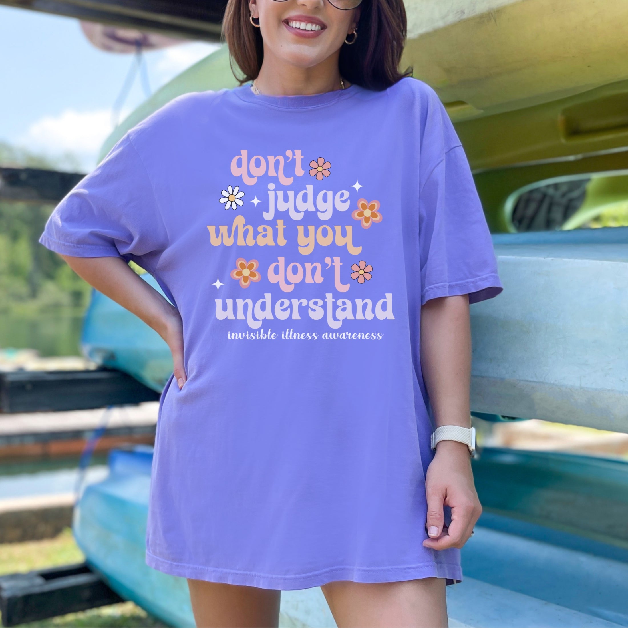 Girl wearing Comfort Colors invisible illness awareness shirt in violet