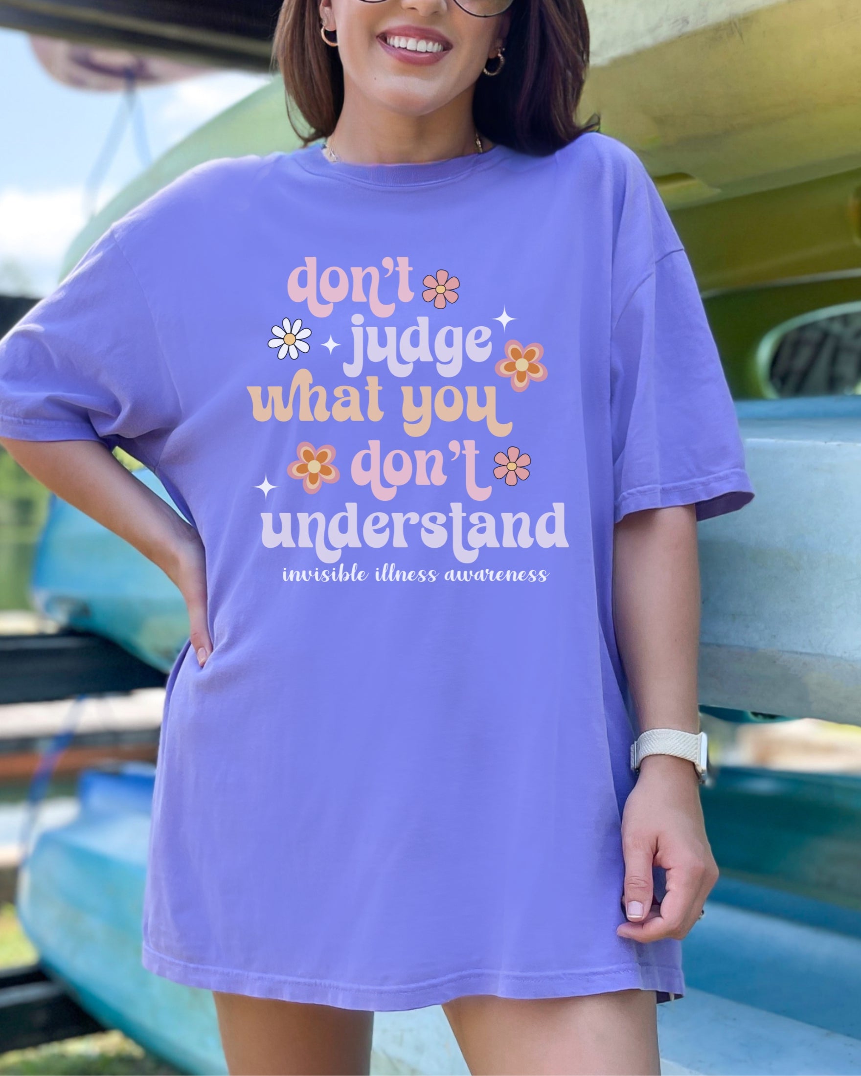 Girl wearing Comfort Colors invisible illness awareness shirt in violet