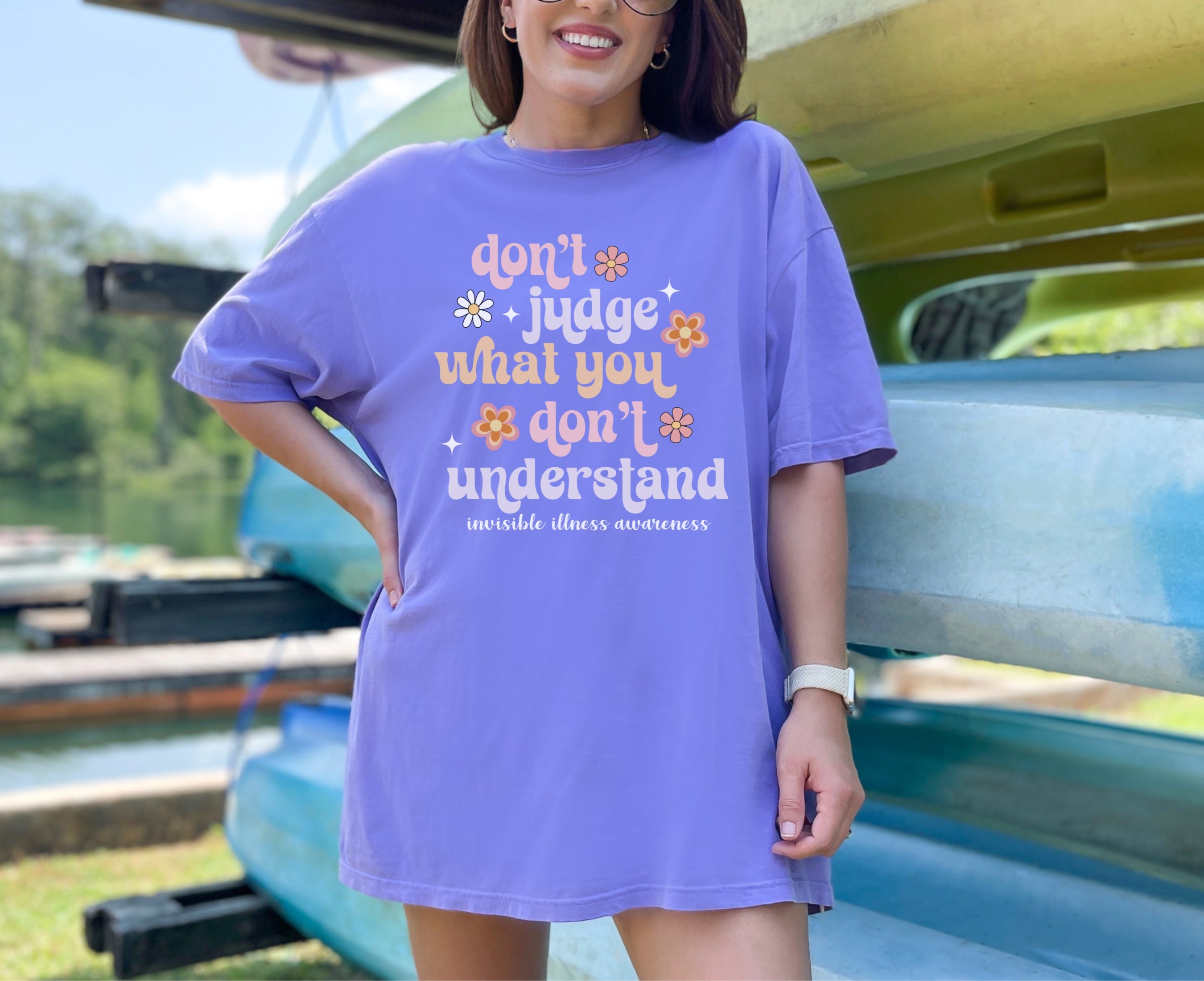 Girl wearing Comfort Colors invisible illness awareness shirt in violet
