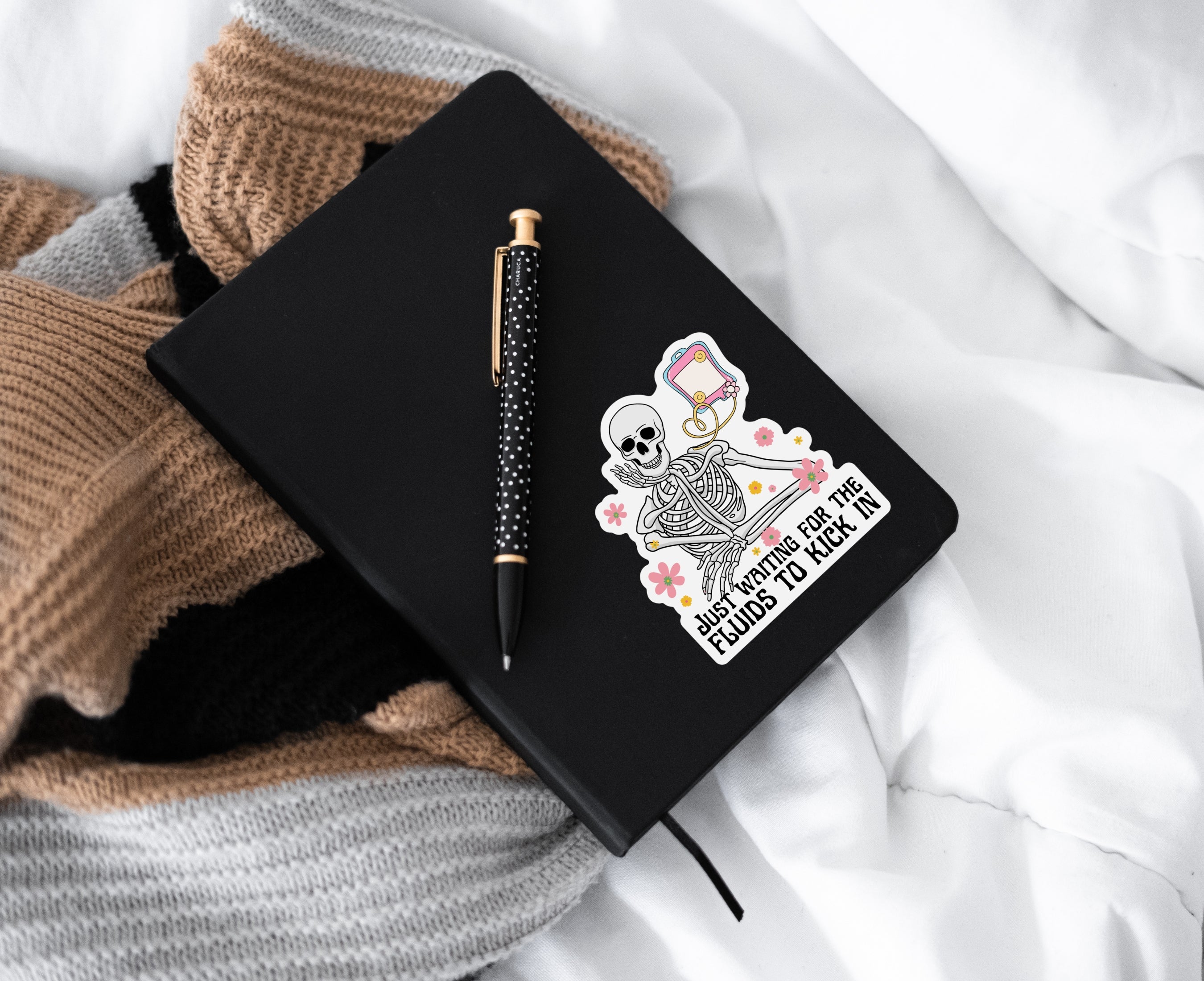 3 inch Sticker of skeleton getting fluids through IV bag on notebook