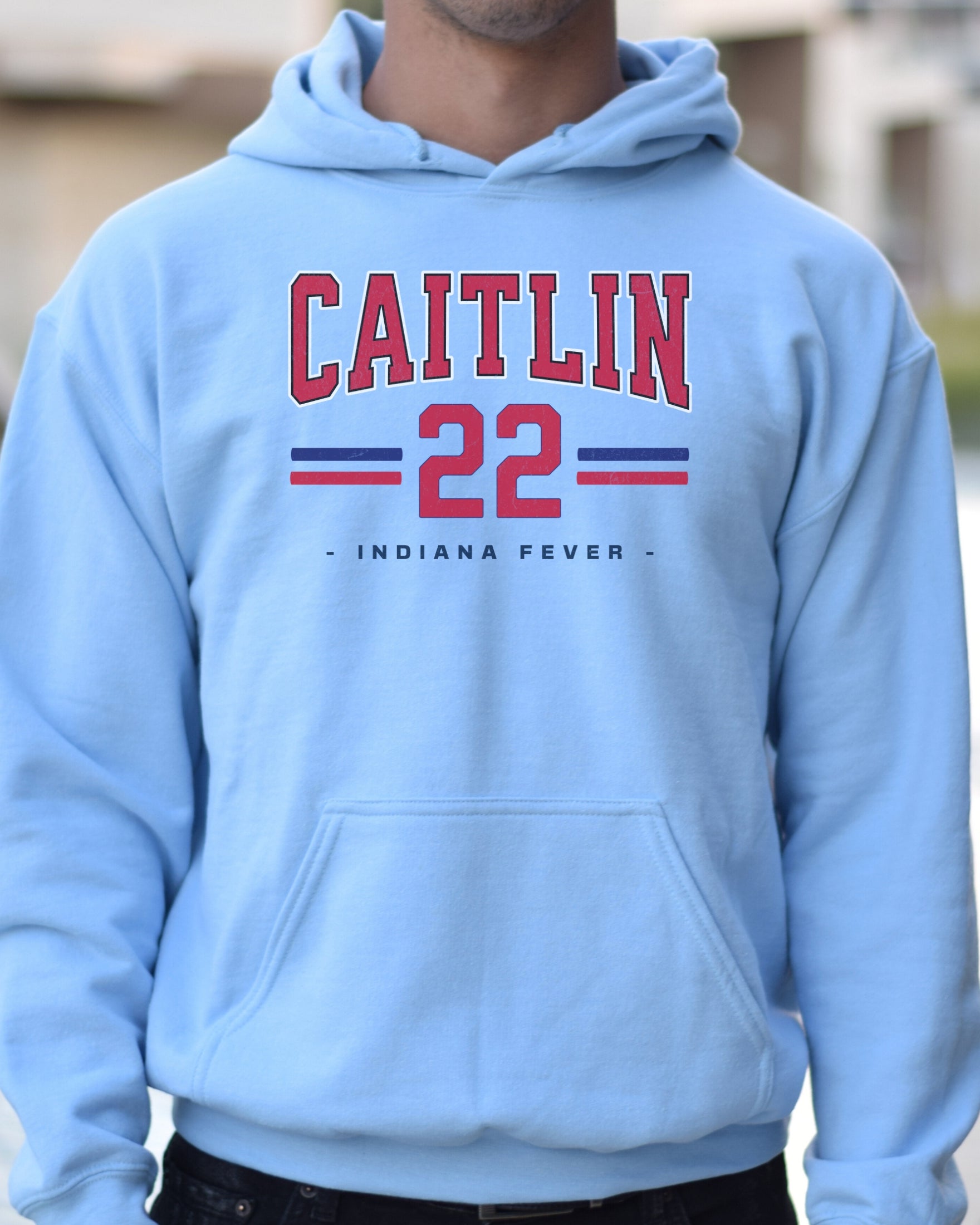 Guy wearing light blue Caitlin Clark 22 Hoodie