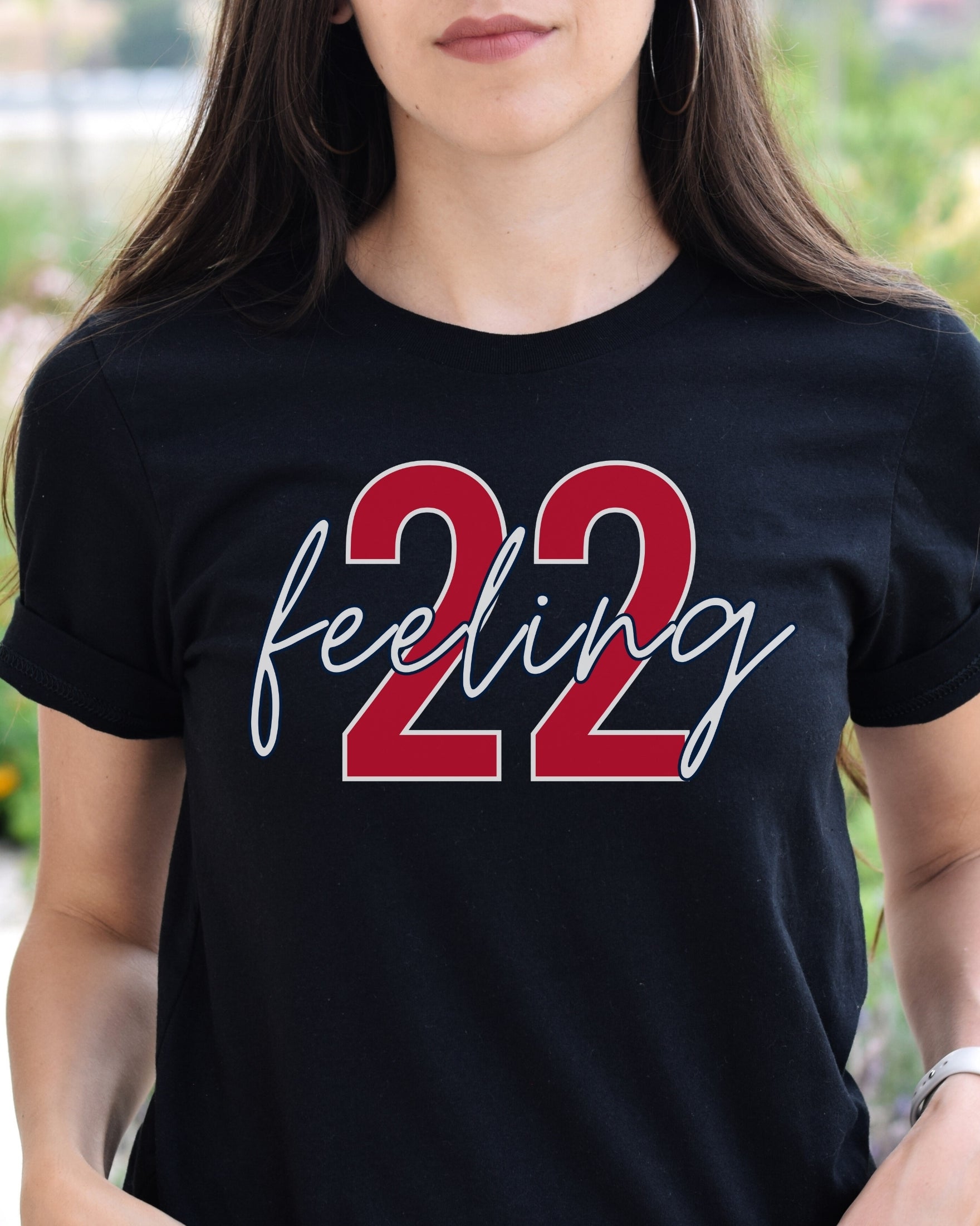 Girl wearing black feeling 22 t-shirt