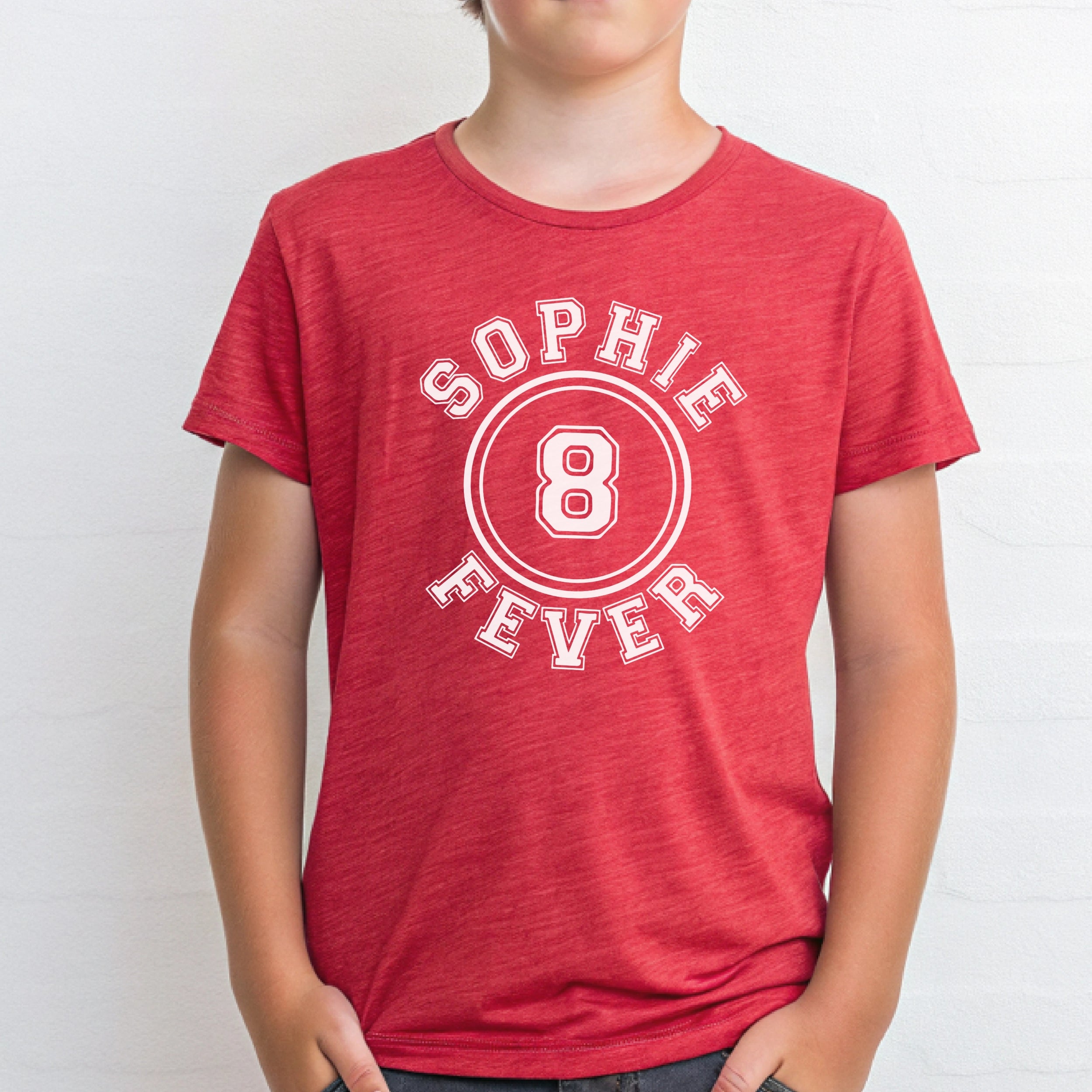 Red t-shirt with 'Sophie 8 Fever' print worn by a person on a white background