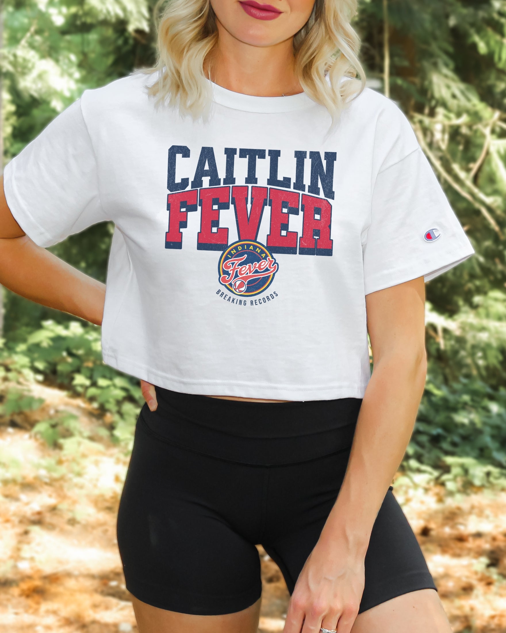 Girl wearing Champion Caitlin Fever Crop Top in white