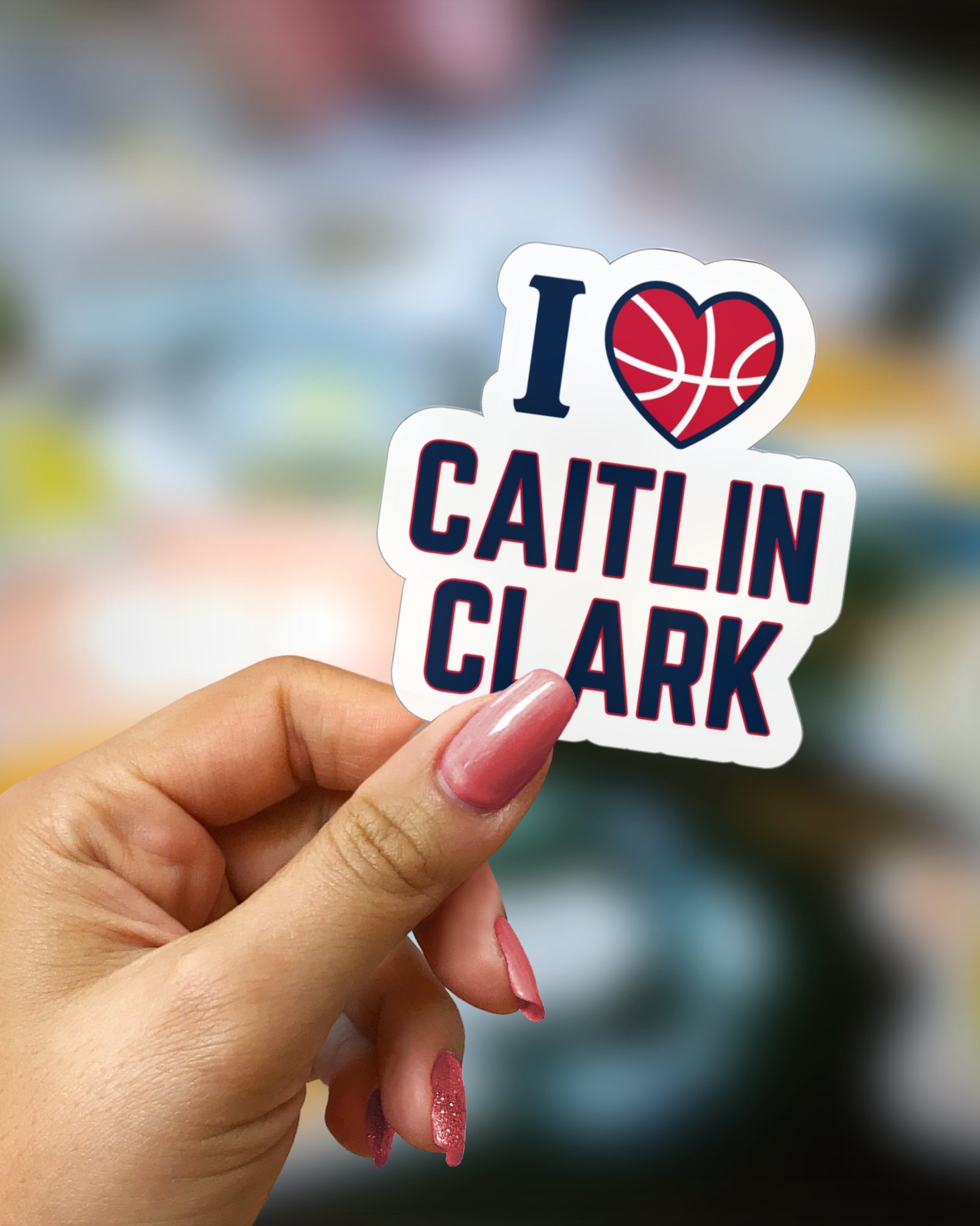 Person holding I love Caitlin Clark Sticker