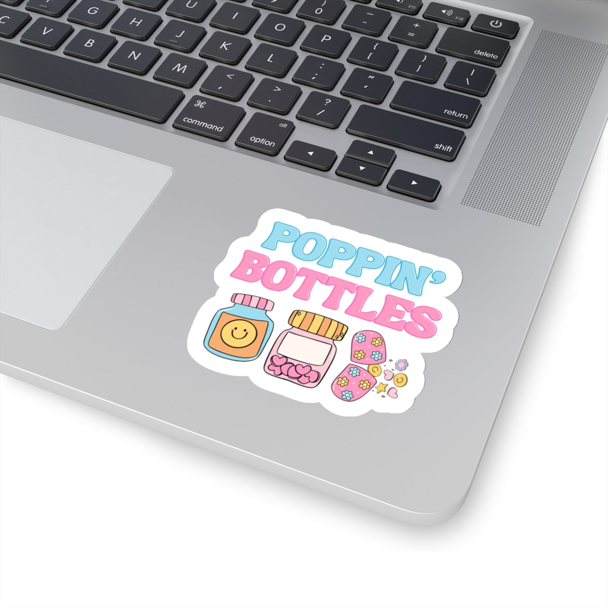 3 inch sticker of pill bottles on laptop
