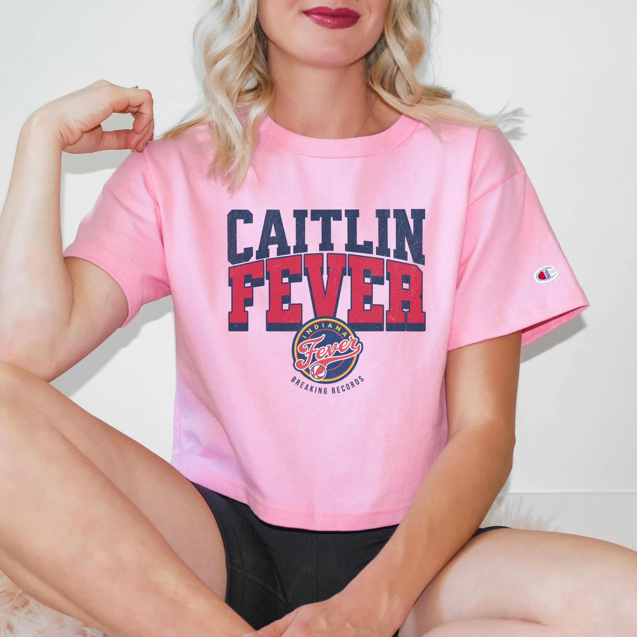Girl wearing Caitlin Fever Crop Top t-shirt in pink