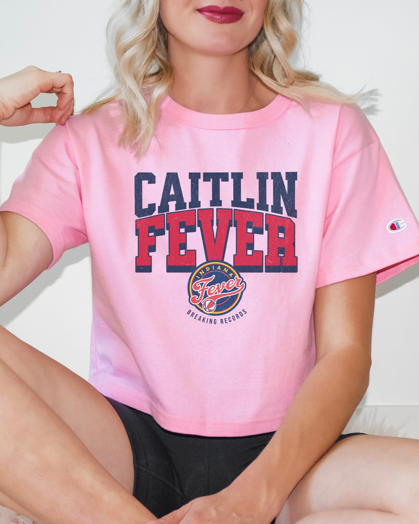 Girl wearing Caitlin Fever Crop Top t-shirt in pink