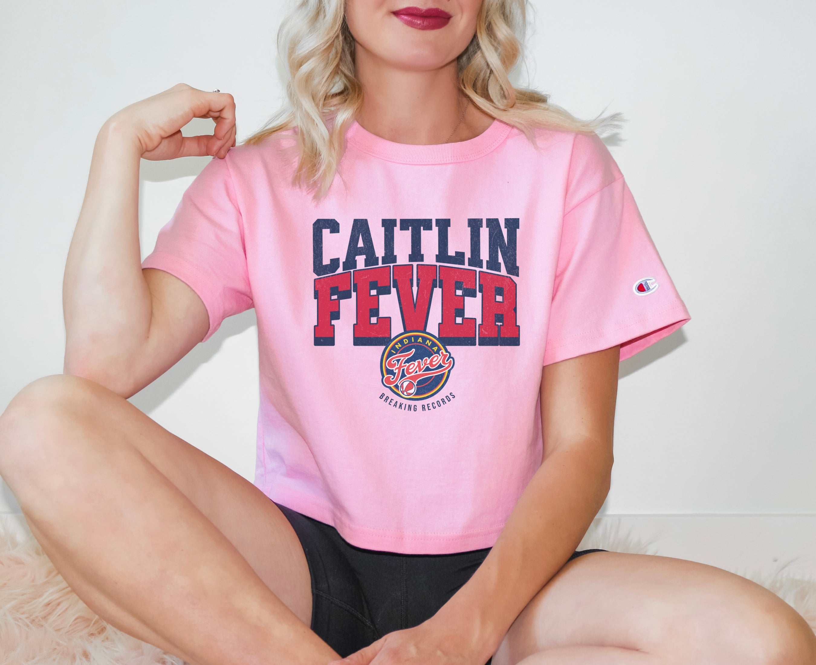 Girl wearing Caitlin Fever Crop Top t-shirt in pink