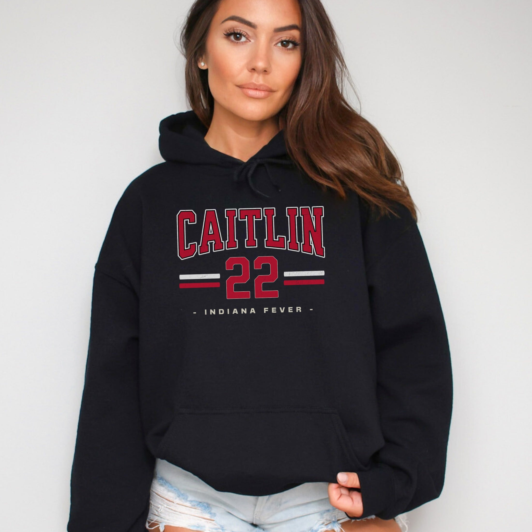 Girl wearing black Caitlin Clark 22 Hoodie