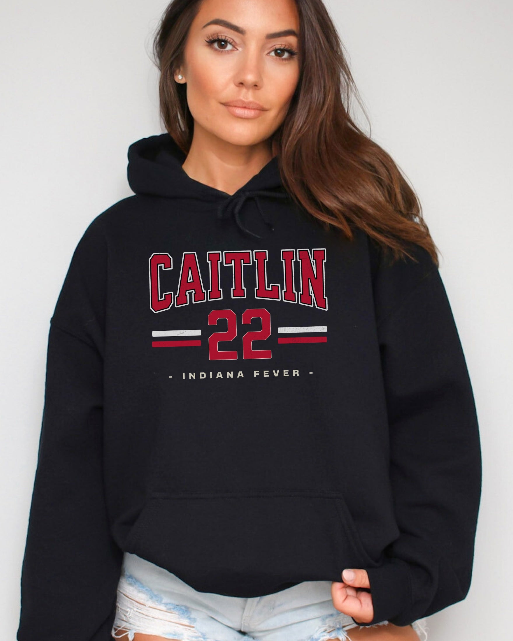 Girl wearing black Caitlin Clark 22 Hoodie