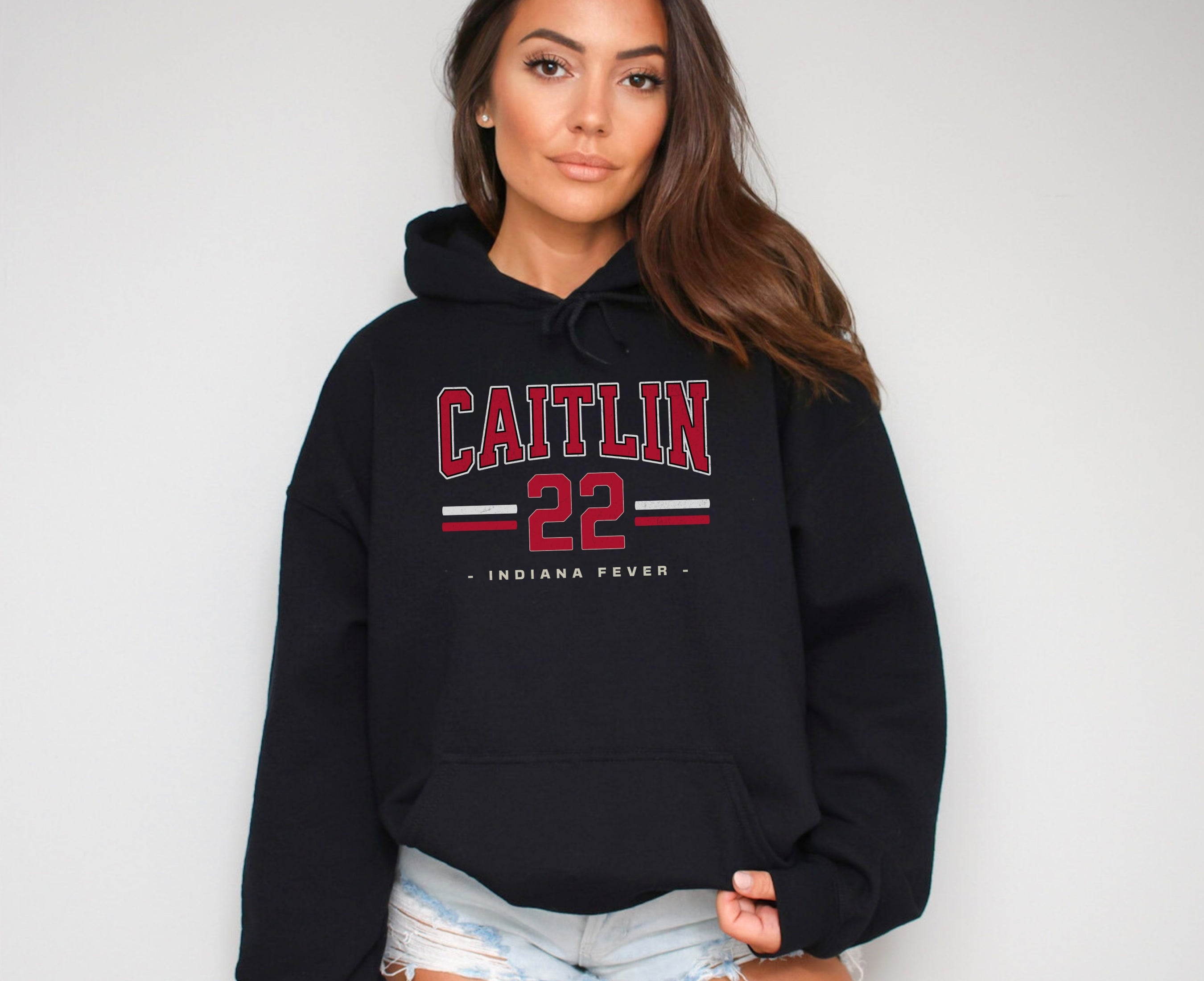 Girl wearing black Caitlin Clark 22 Hoodie