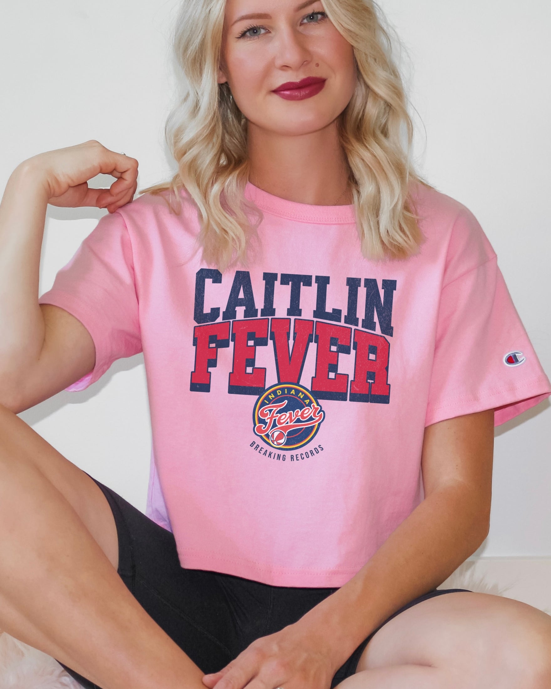 Girl wearing Champion Caitlin Fever Crop Top t-shirt in pink