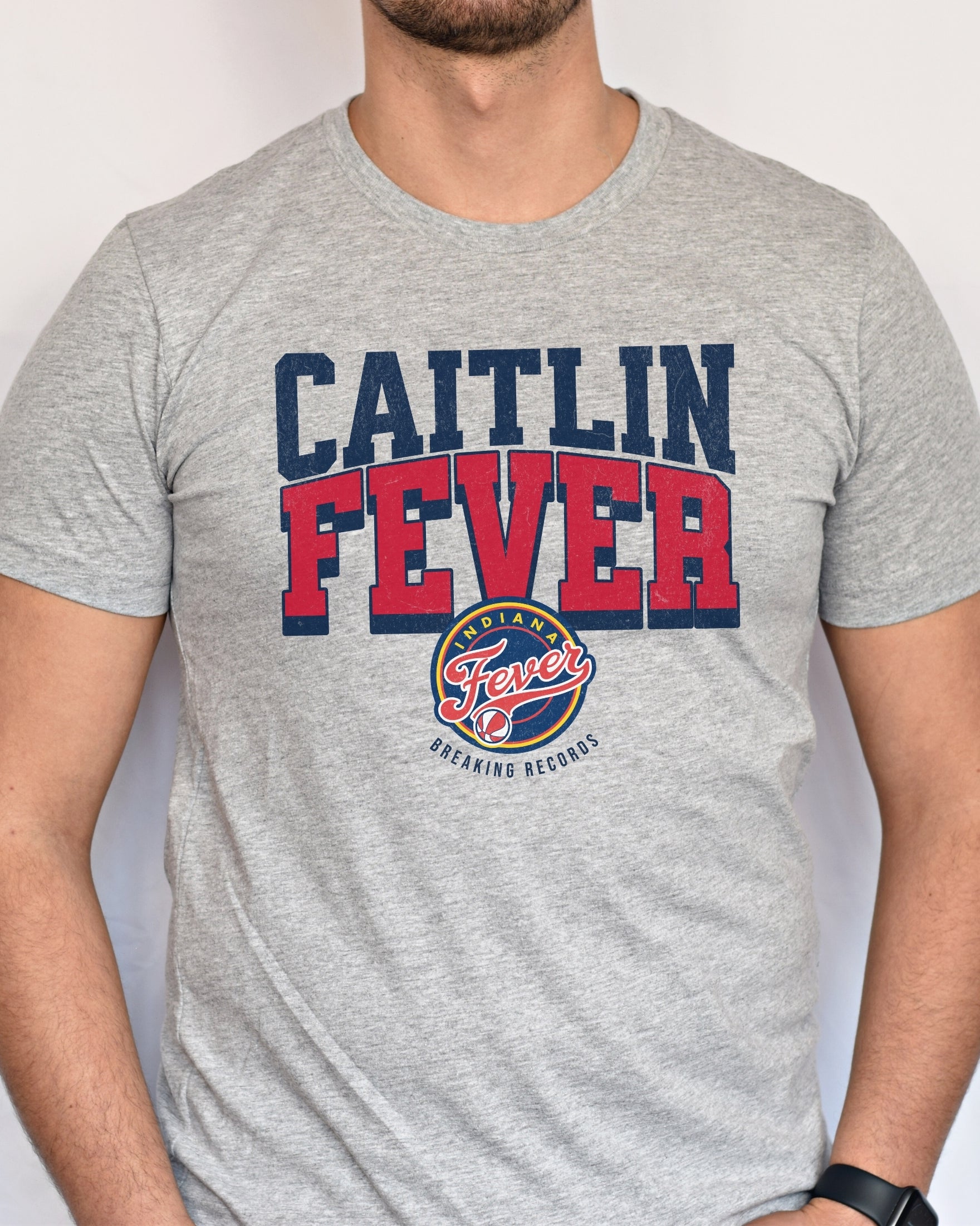 Man wearing Athletic Heather Caitlin Fever shirt