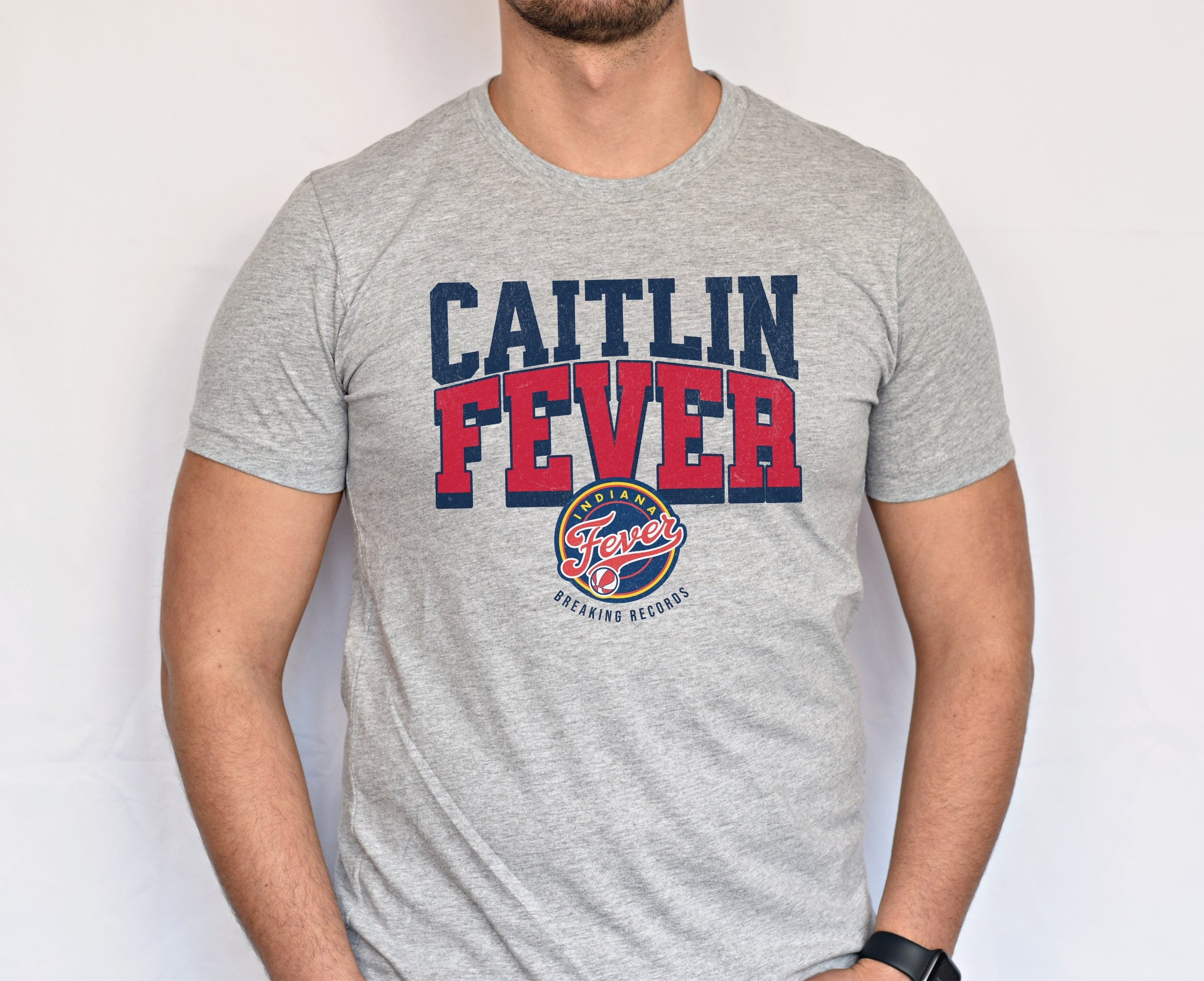 Man wearing Athletic Heather Caitlin Fever shirt