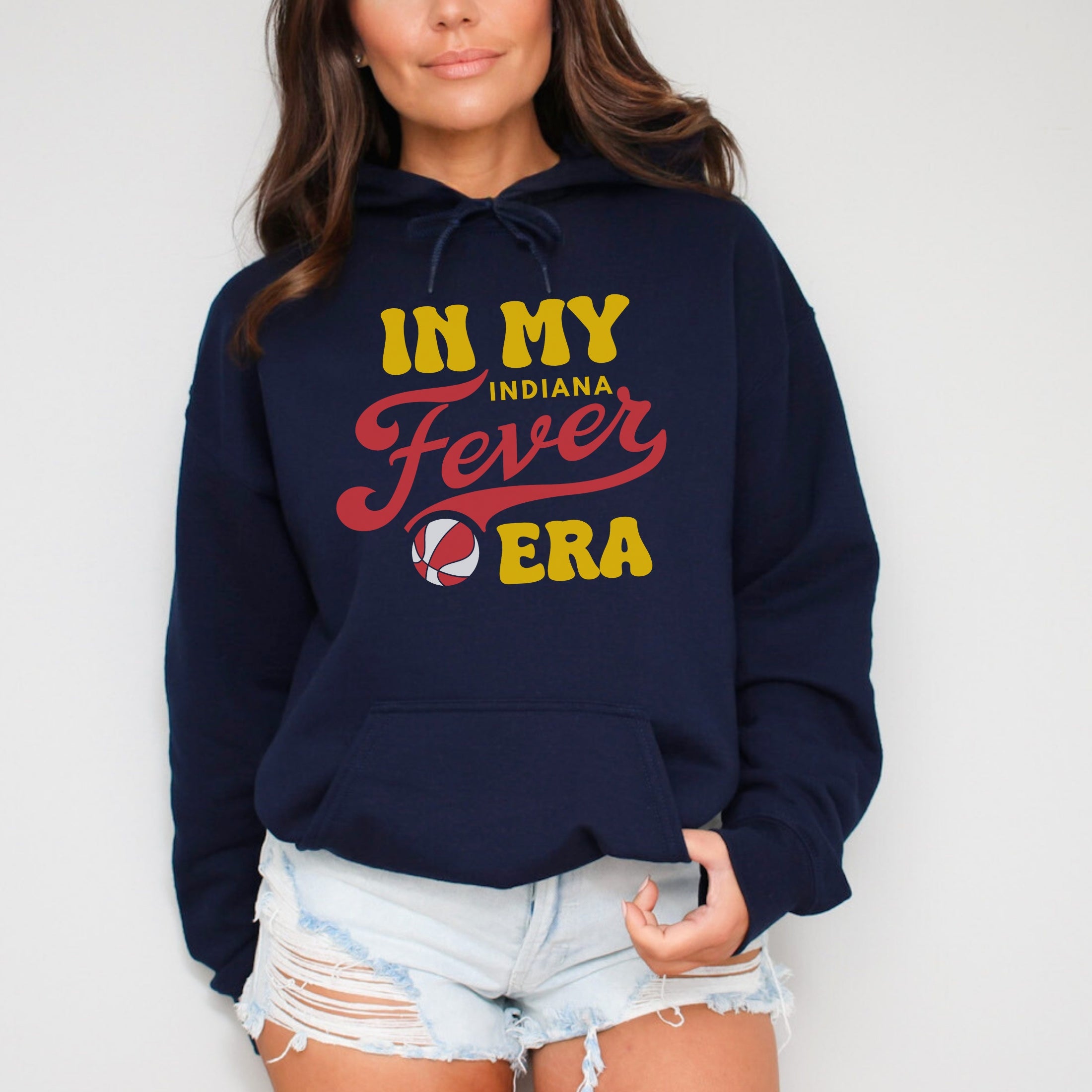 Woman wearing navy in my Fever era hoodie