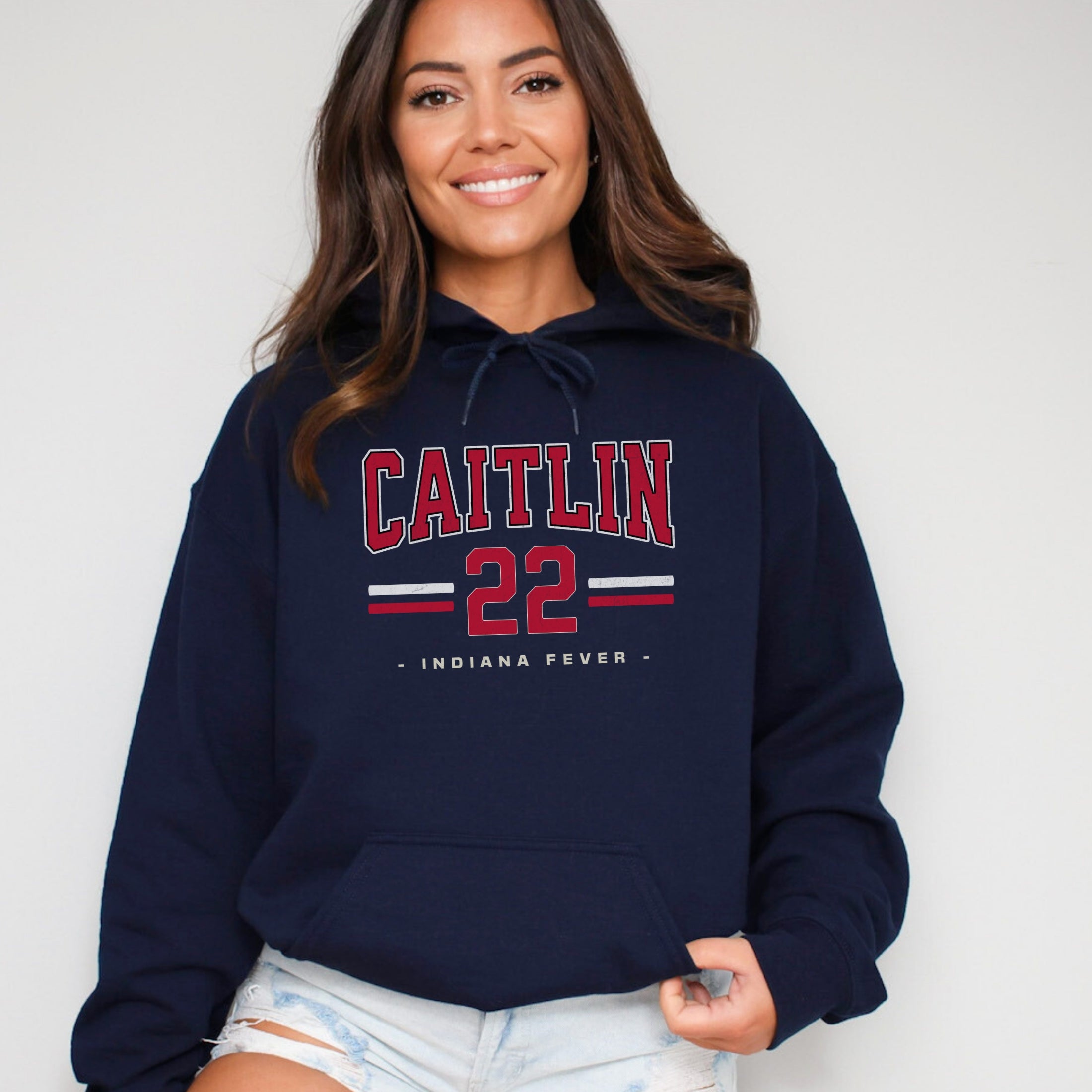 Girl wearing navy Caitlin Clark 22 Hoodie