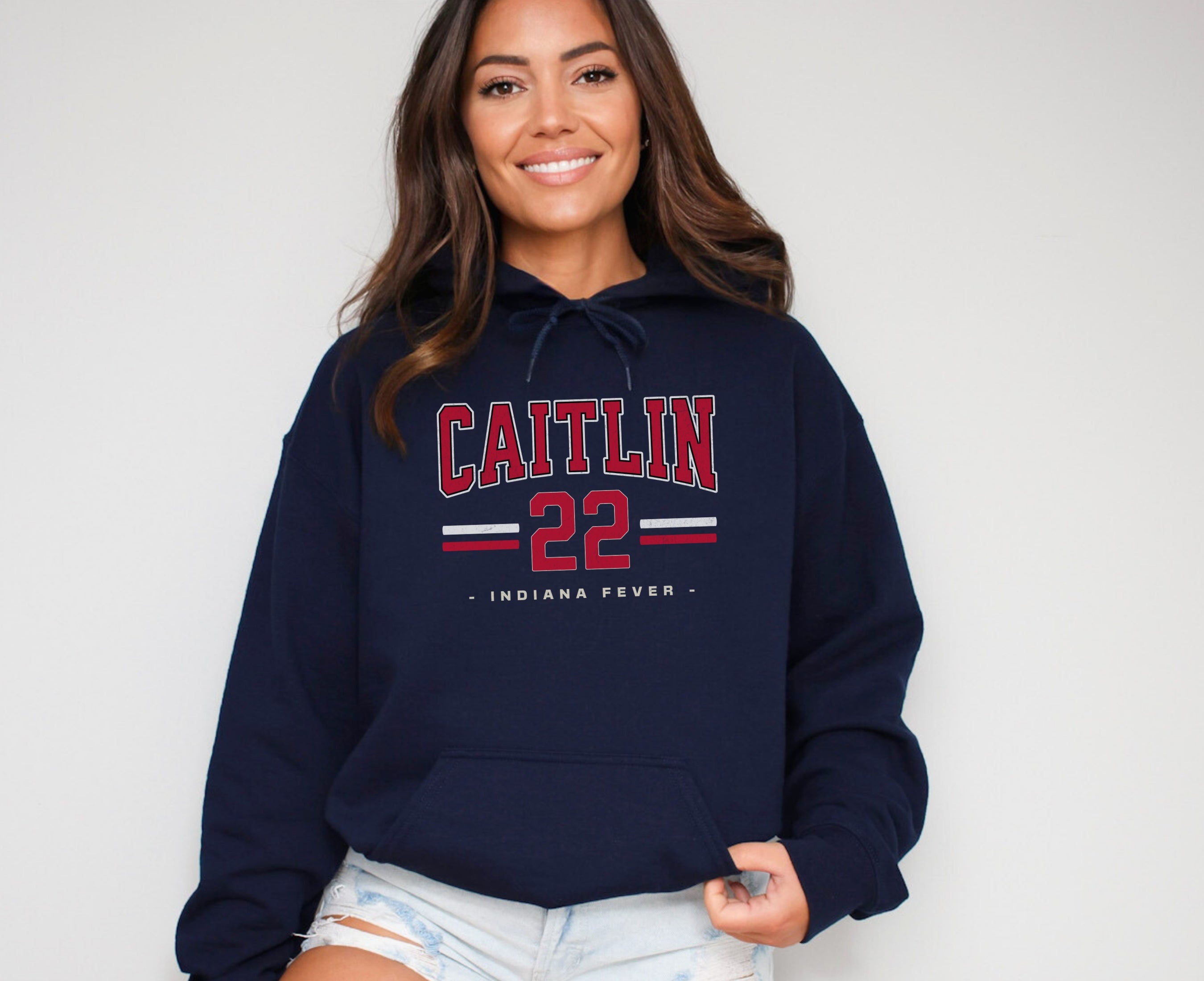 Girl wearing navy Caitlin Clark 22 Hoodie