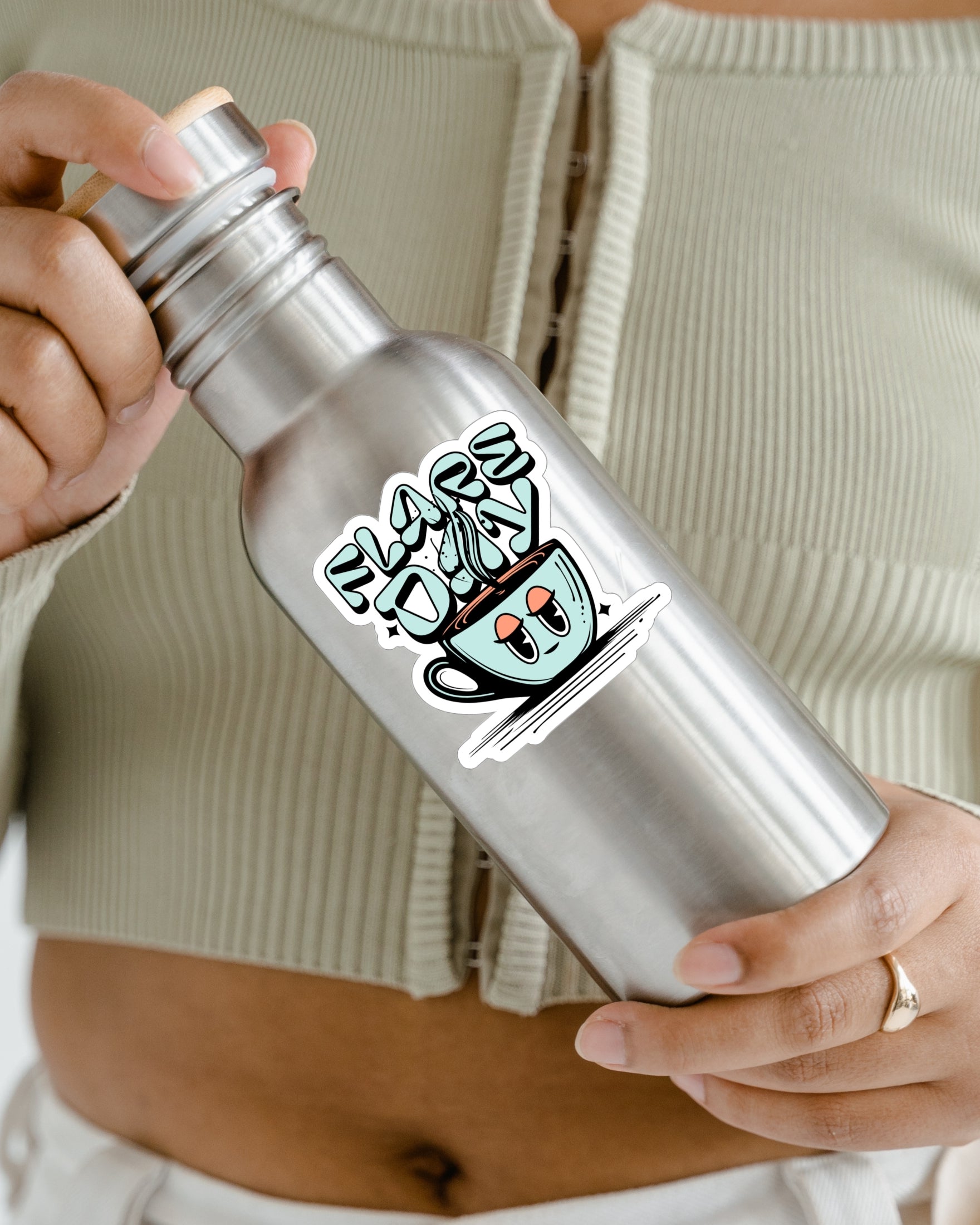 Tired mug flare day sticker on water bottle