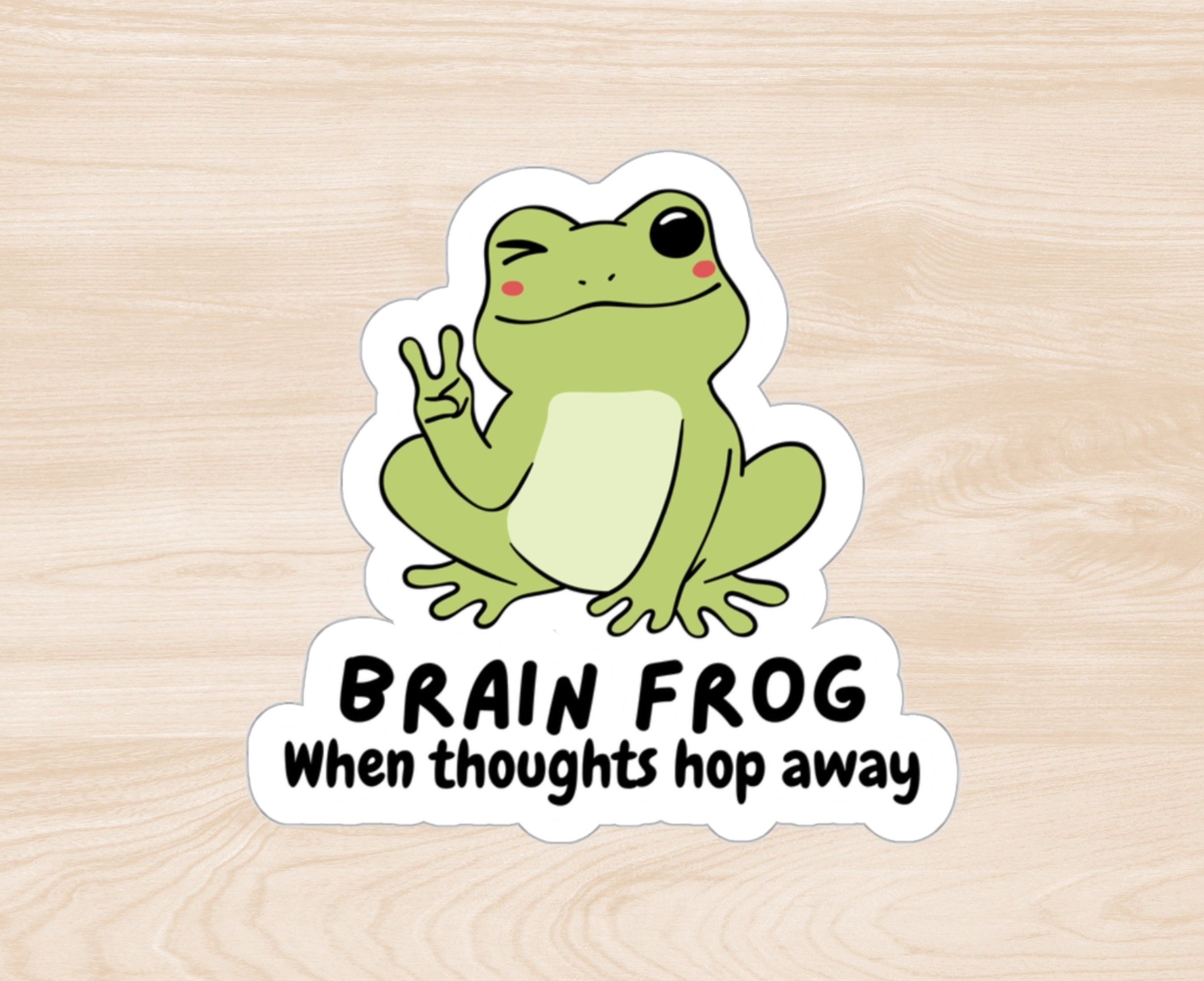Sticker that says Brain Frog: When thoughts hop away - with a frog winking and giving the peace sign