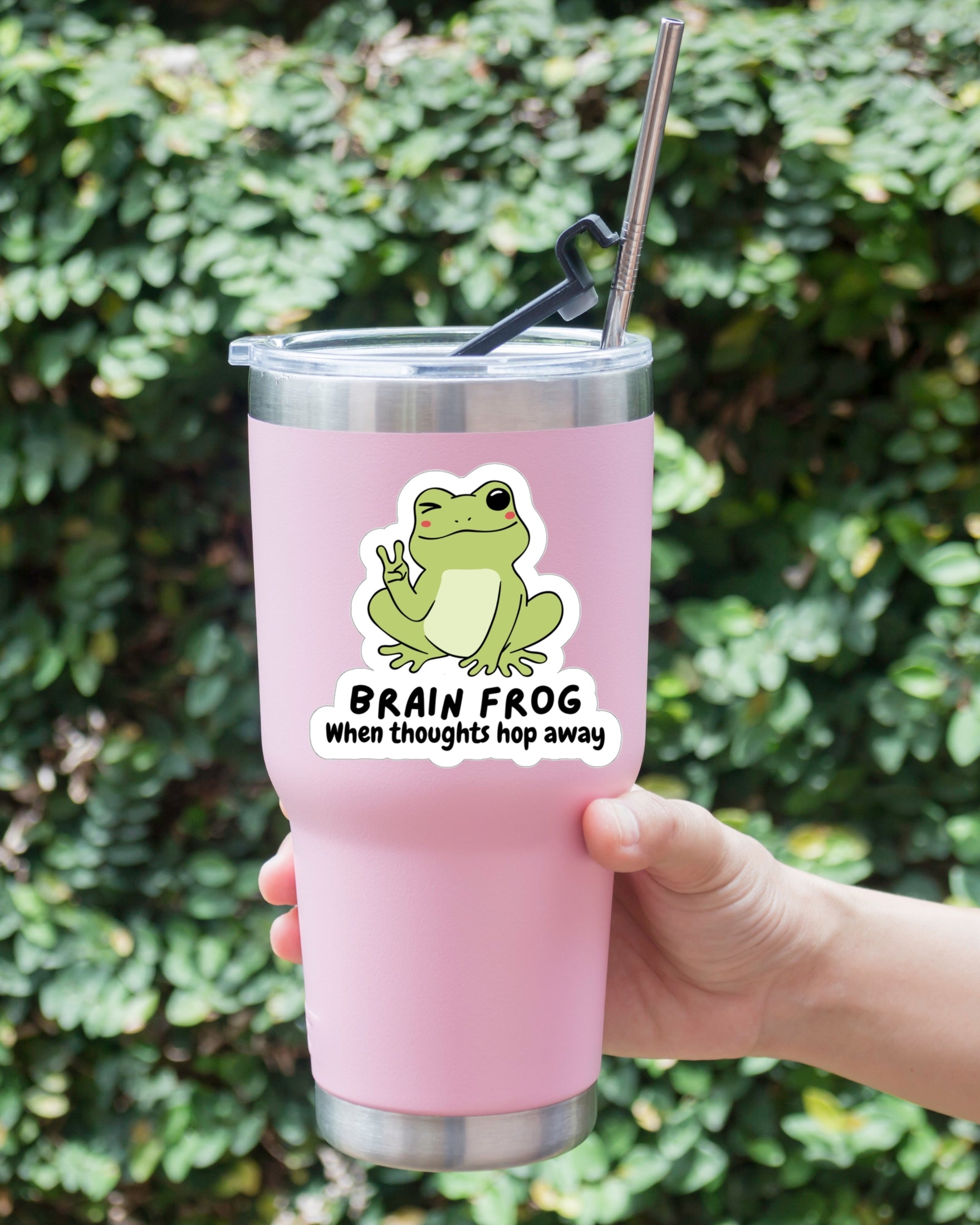 Sticker of a frog giving the peace sign for those with Brain Fog stuck on a tumbler