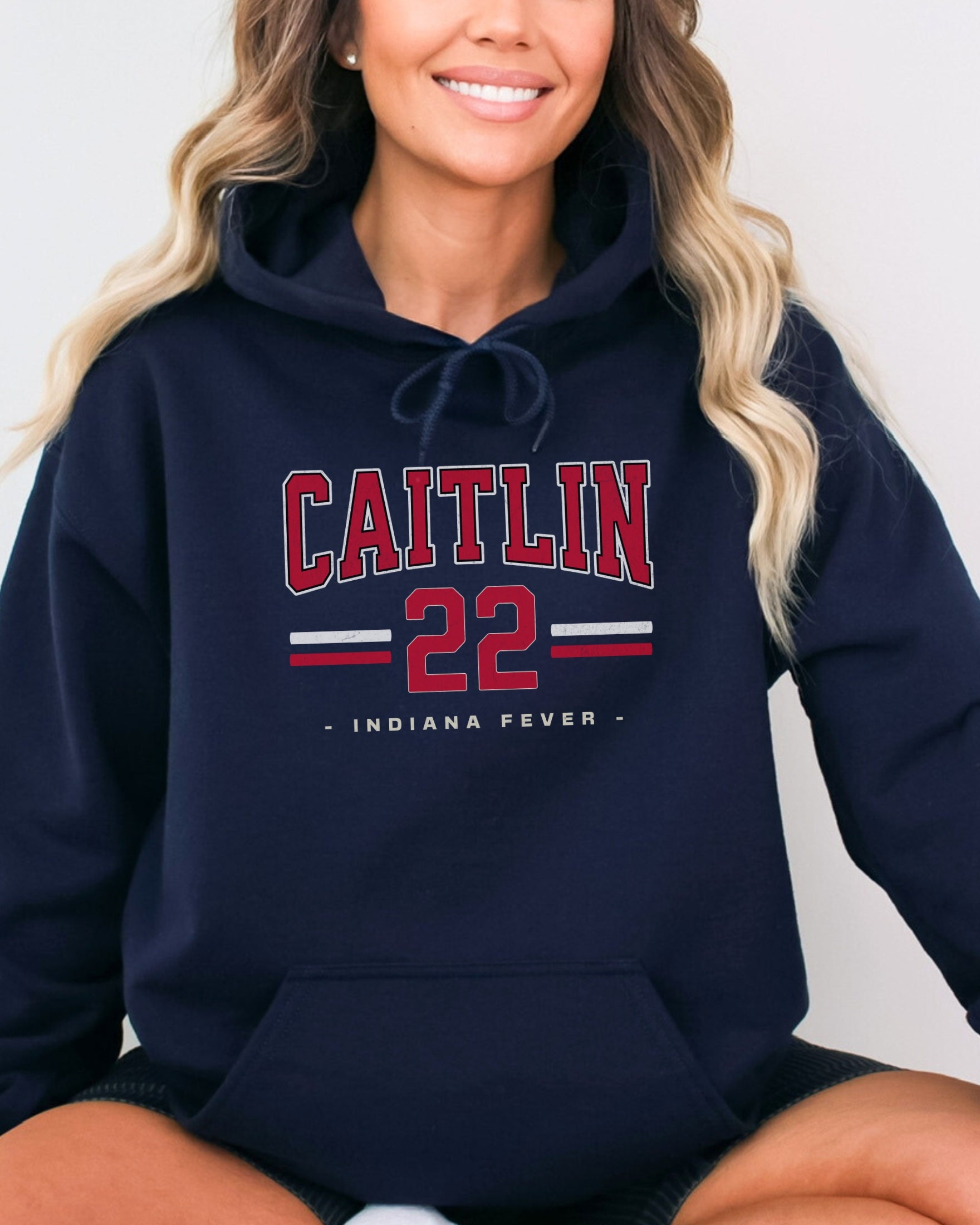 Girl wearing navy Caitlin Clark 22 Hoodie