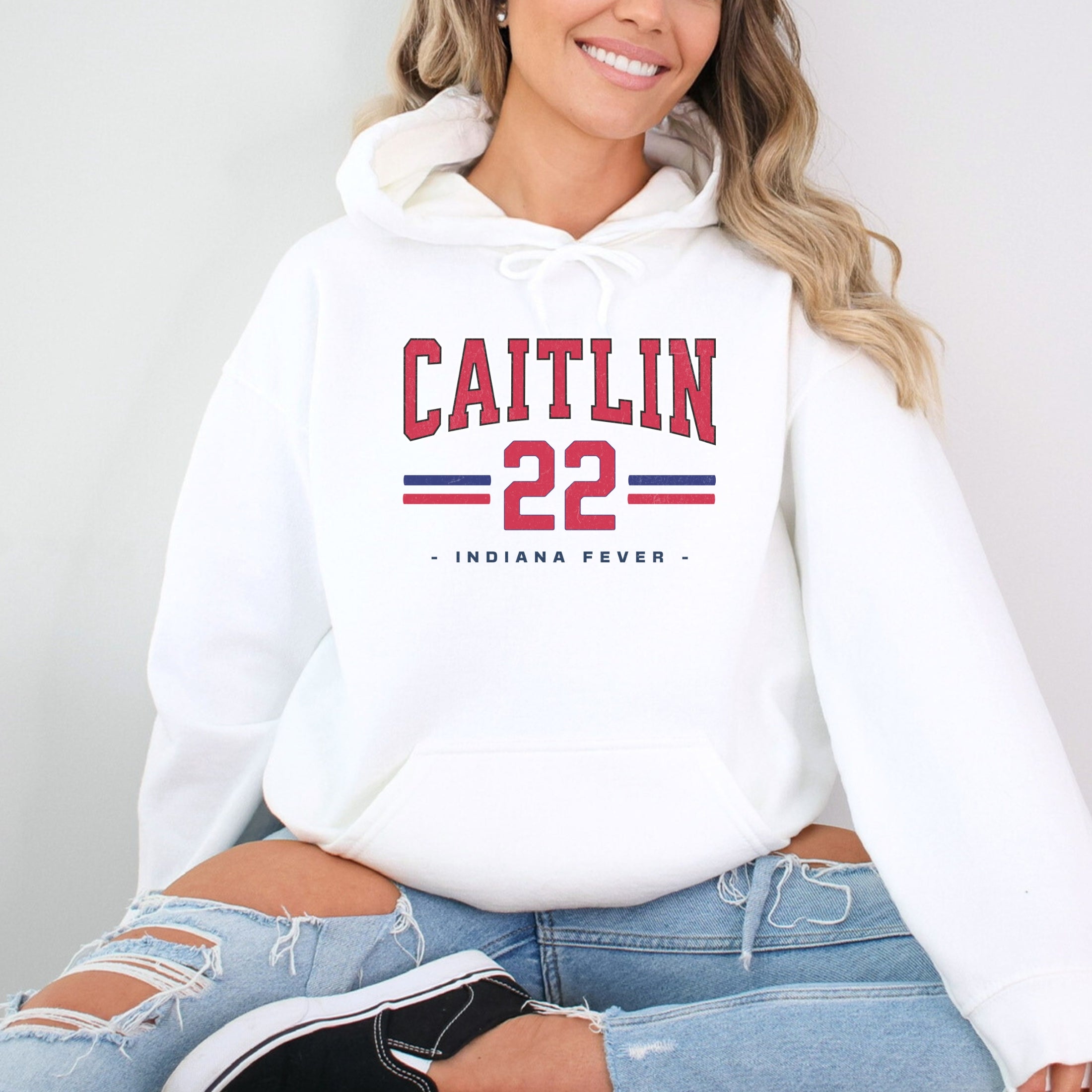Girl wearing white Caitlin Clark 22 Hoodie