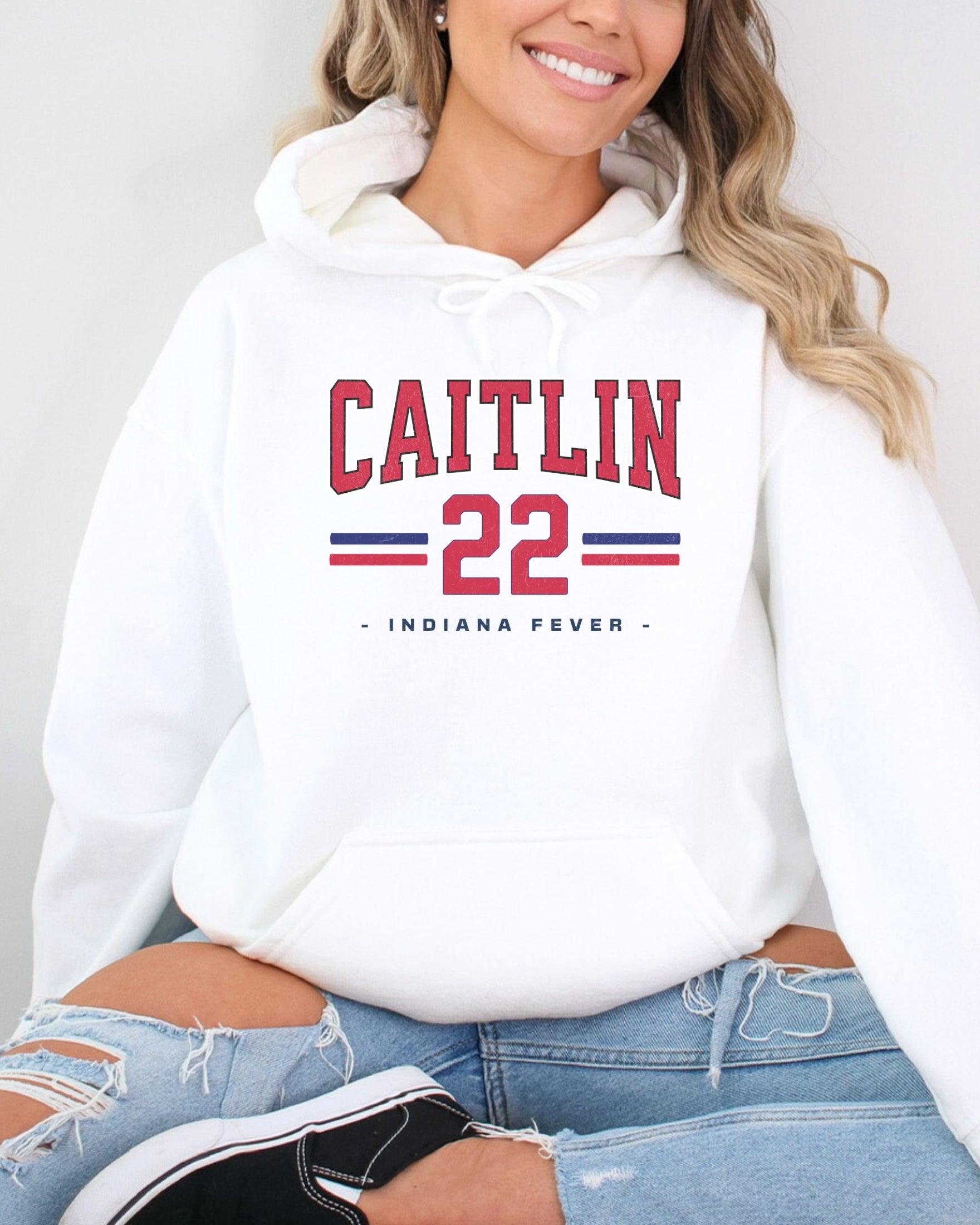 Girl wearing white Caitlin Clark 22 Hoodie