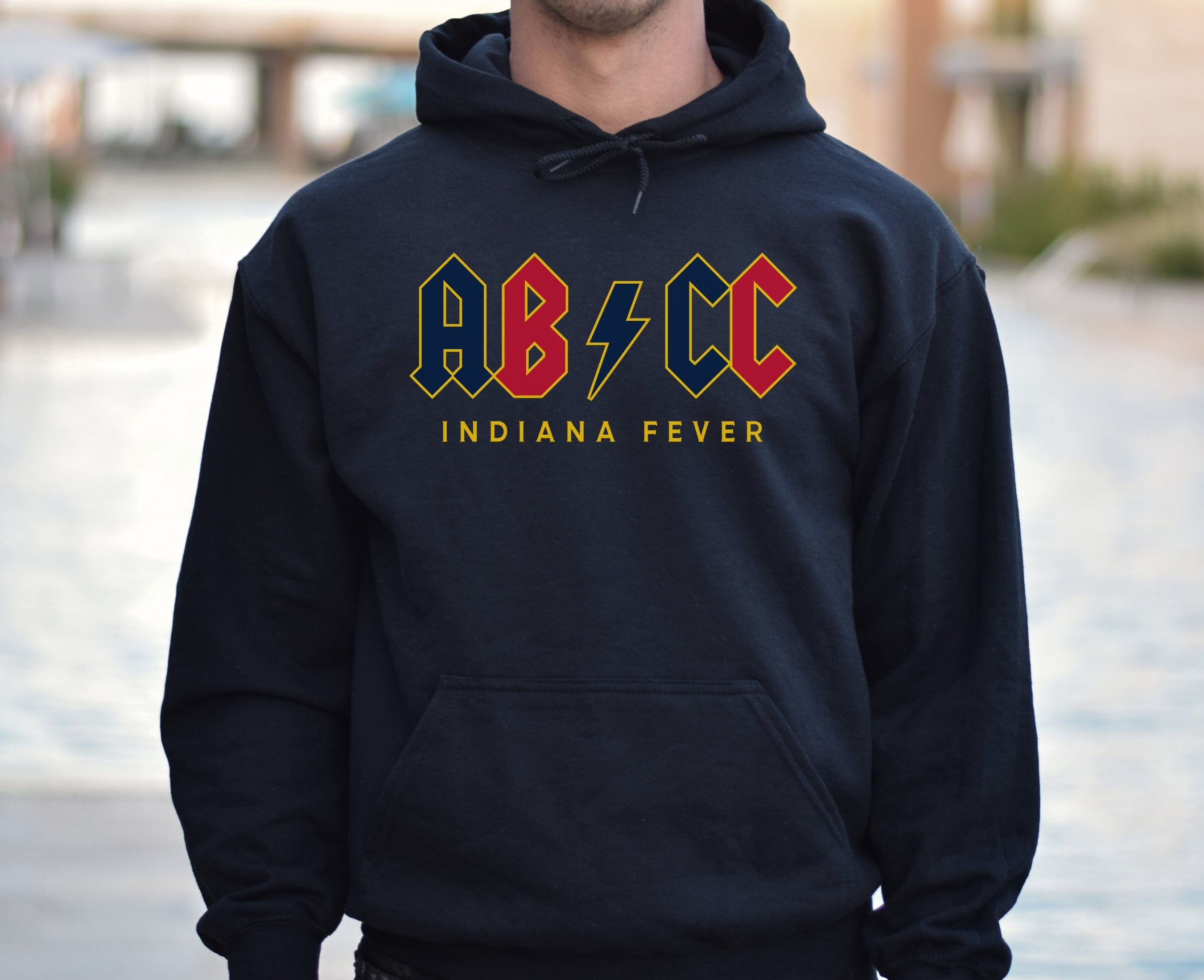 Guy wearing black ABCC Indiana Fever hoodie