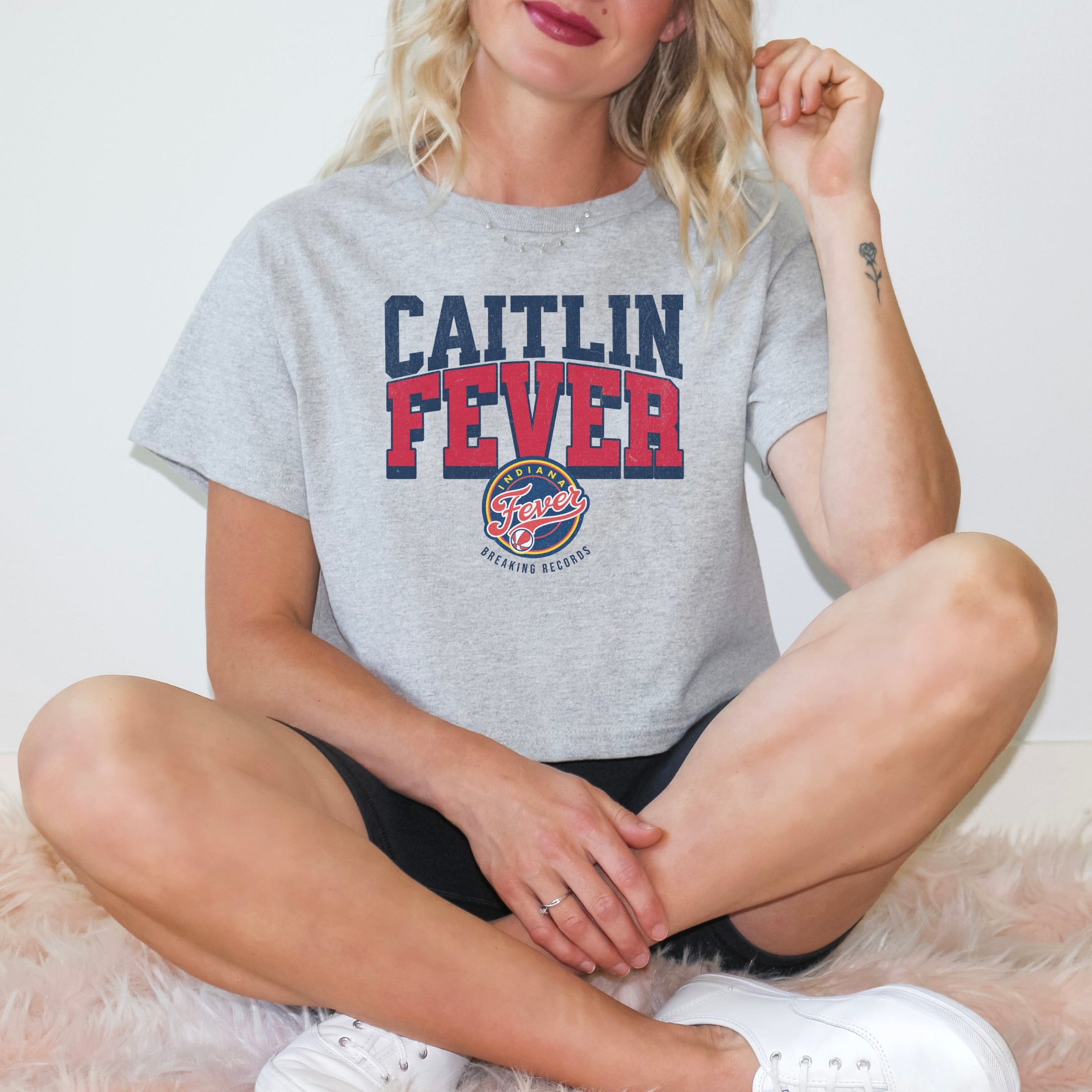 Girl wearing Caitlin Fever Crop Top t-shirt in athletic heather
