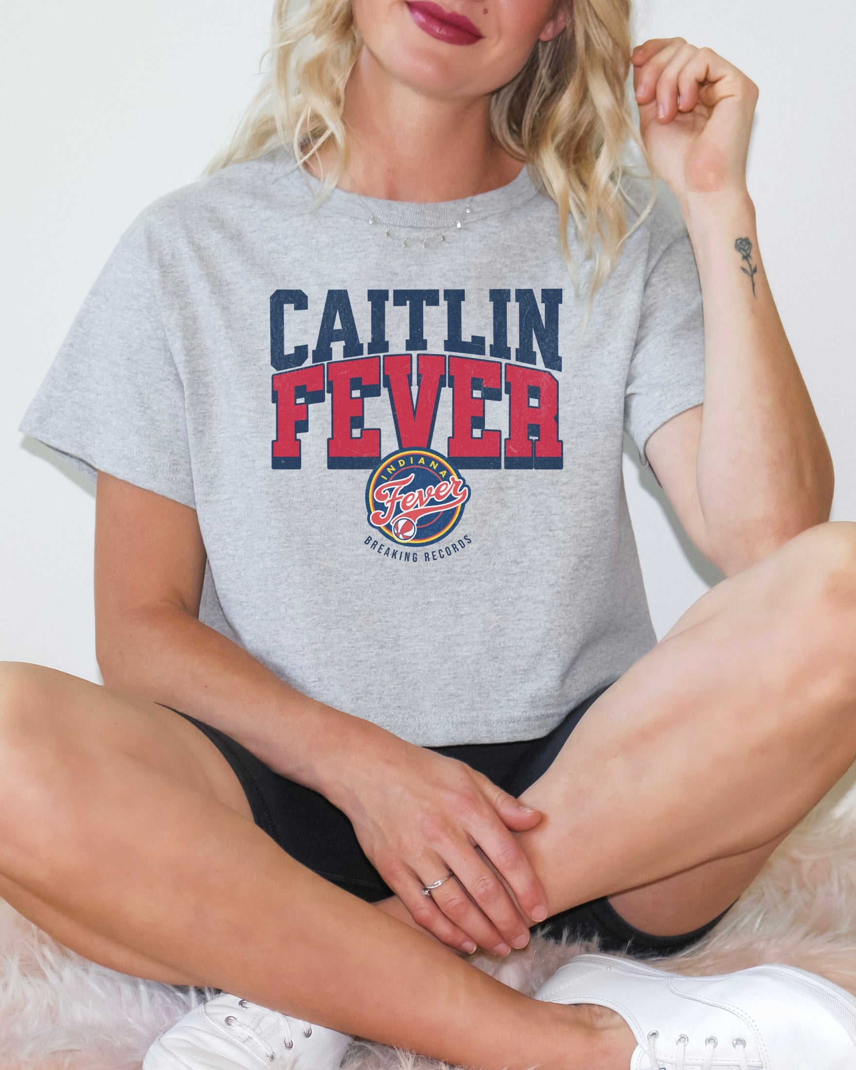 Girl wearing Caitlin Fever Crop Top t-shirt in athletic heather